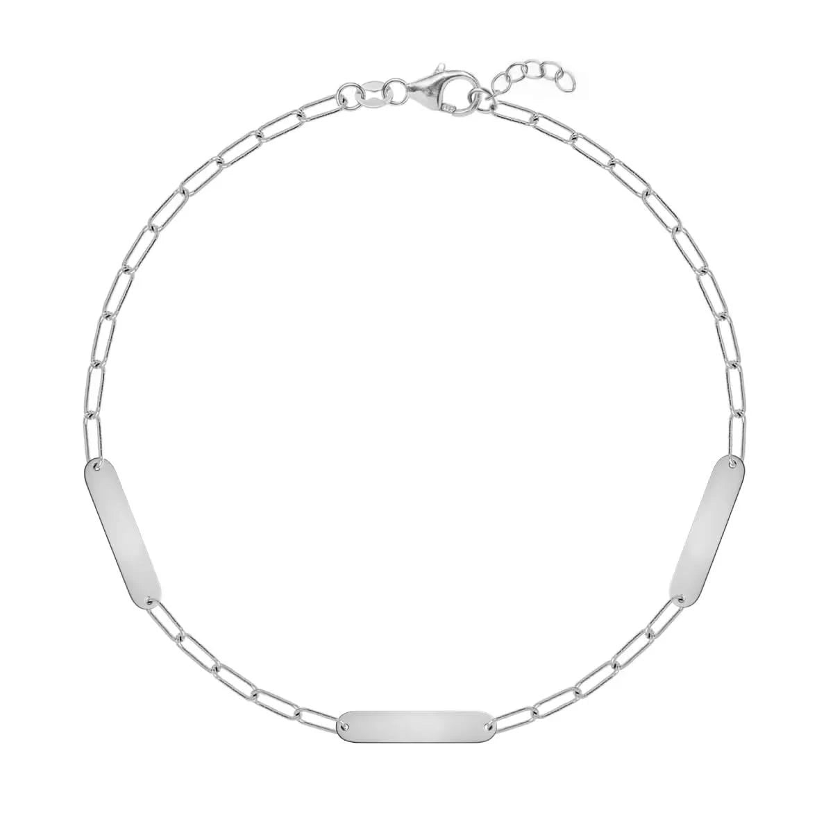 Three 16.33 x 3.72 mm flat petite nameplates on a 14k white gold Adelaide Mini chain bracelet with extender clasp - front view.