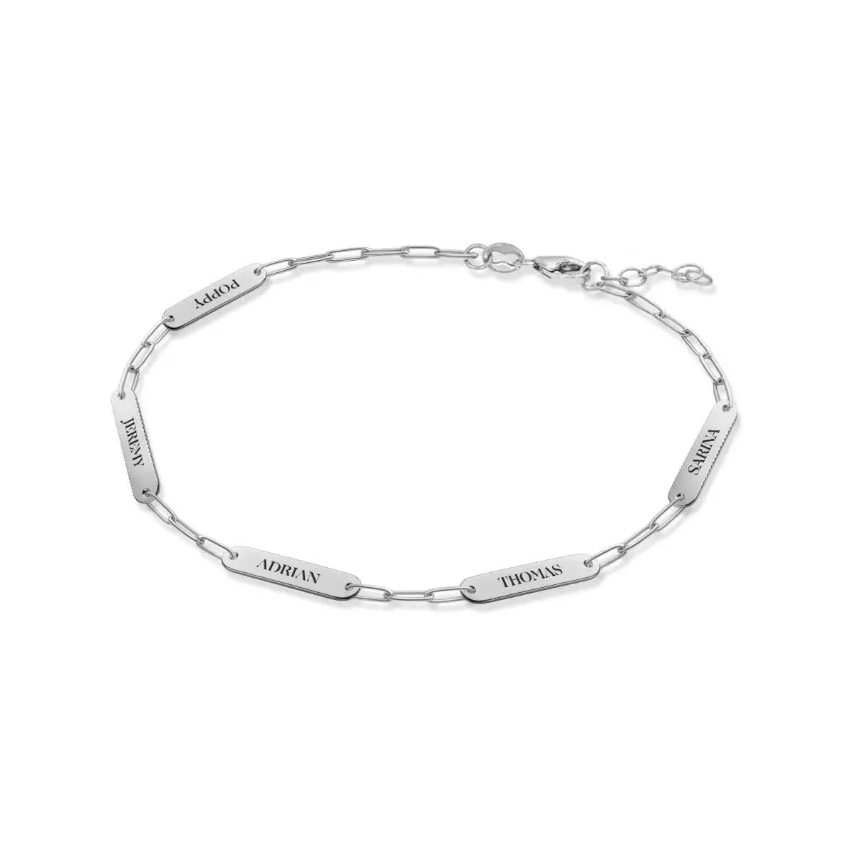 Custom 14k white gold bracelet engraved with the names Poppy, Jeremy, Adrian, Thomas, and Sarina on five 16.33 x 3.72 mm flat petite nameplates.