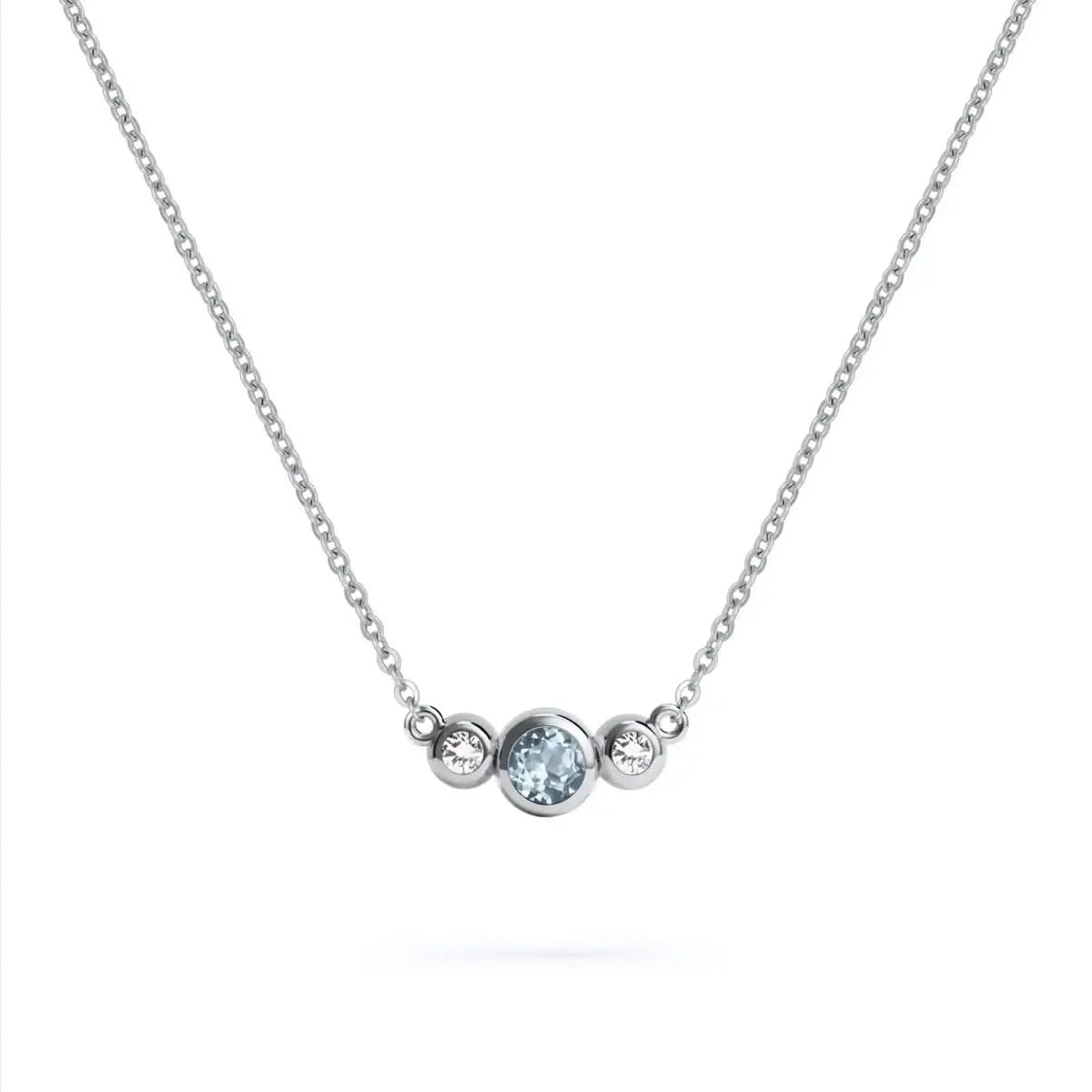 Barrington 3 Stone Necklace featuring a 4 mm round cut Aquamarine center stone framed by two 2 mm round cut Diamonds bezel set in 14k white gold on a saffron chain – front view.