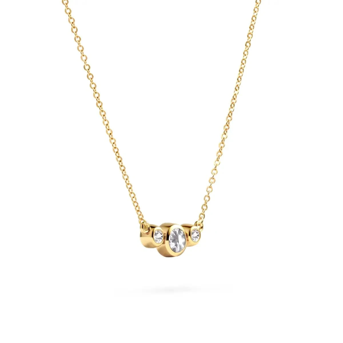 Barrington 3 Stone Necklace featuring a 4 mm round cut White Topaz center stone framed by two 2 mm round cut Diamonds bezel set in 14k yellow gold on a saffron chain - angled view.