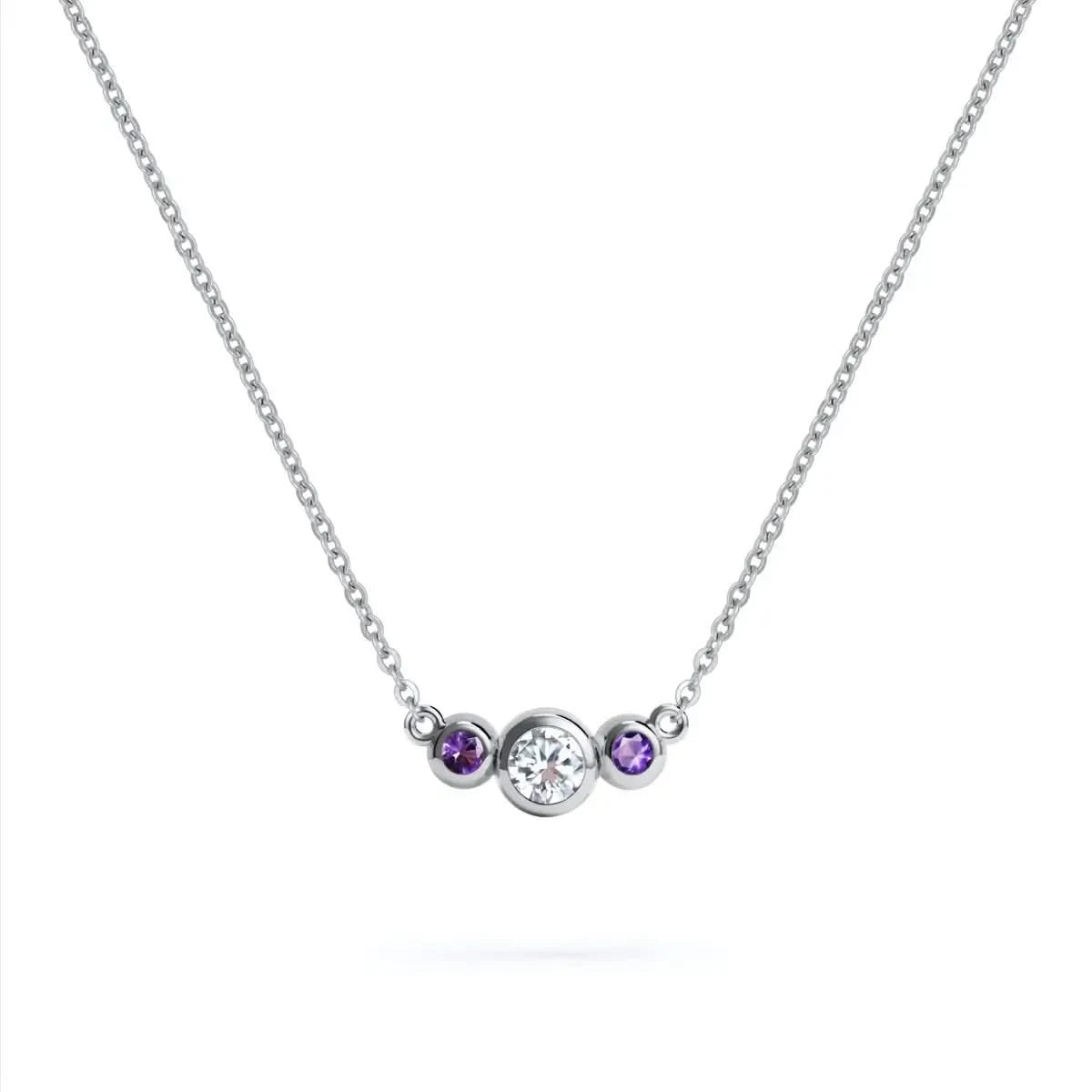 Barrington 3 Stone Necklace featuring a 4 mm round cut Diamond center stone framed by two 2 mm round cut Amethysts bezel set in 14k white gold on a saffron chain – front view.