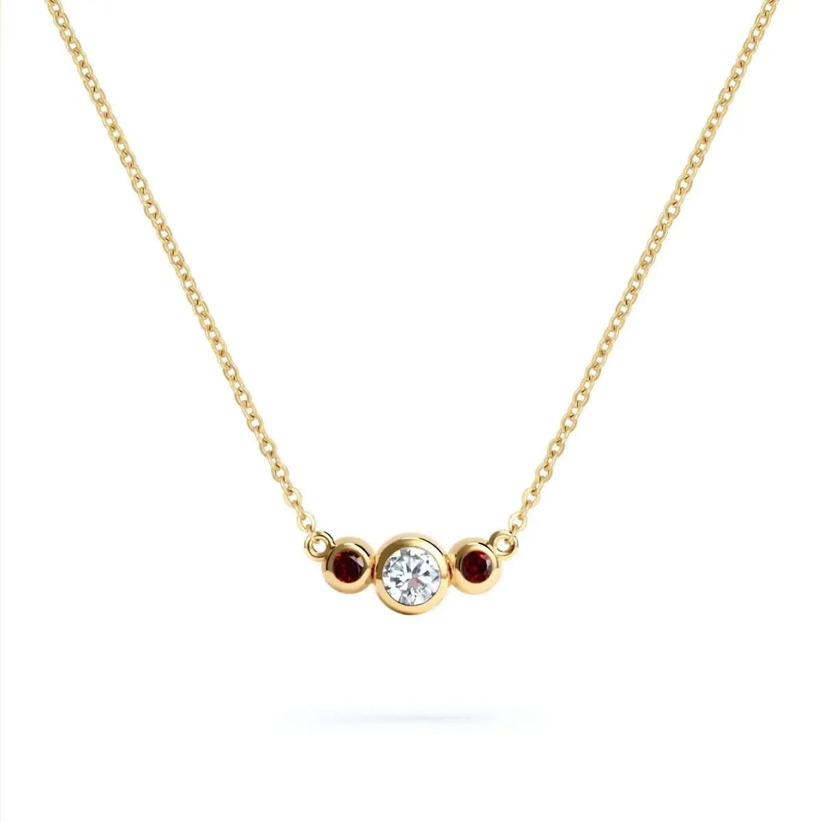 Barrington 3 Stone Necklace featuring a 4 mm round cut Diamond center stone framed by two 2 mm round cut Garnets bezel set in 14k yellow gold on a saffron chain – front view