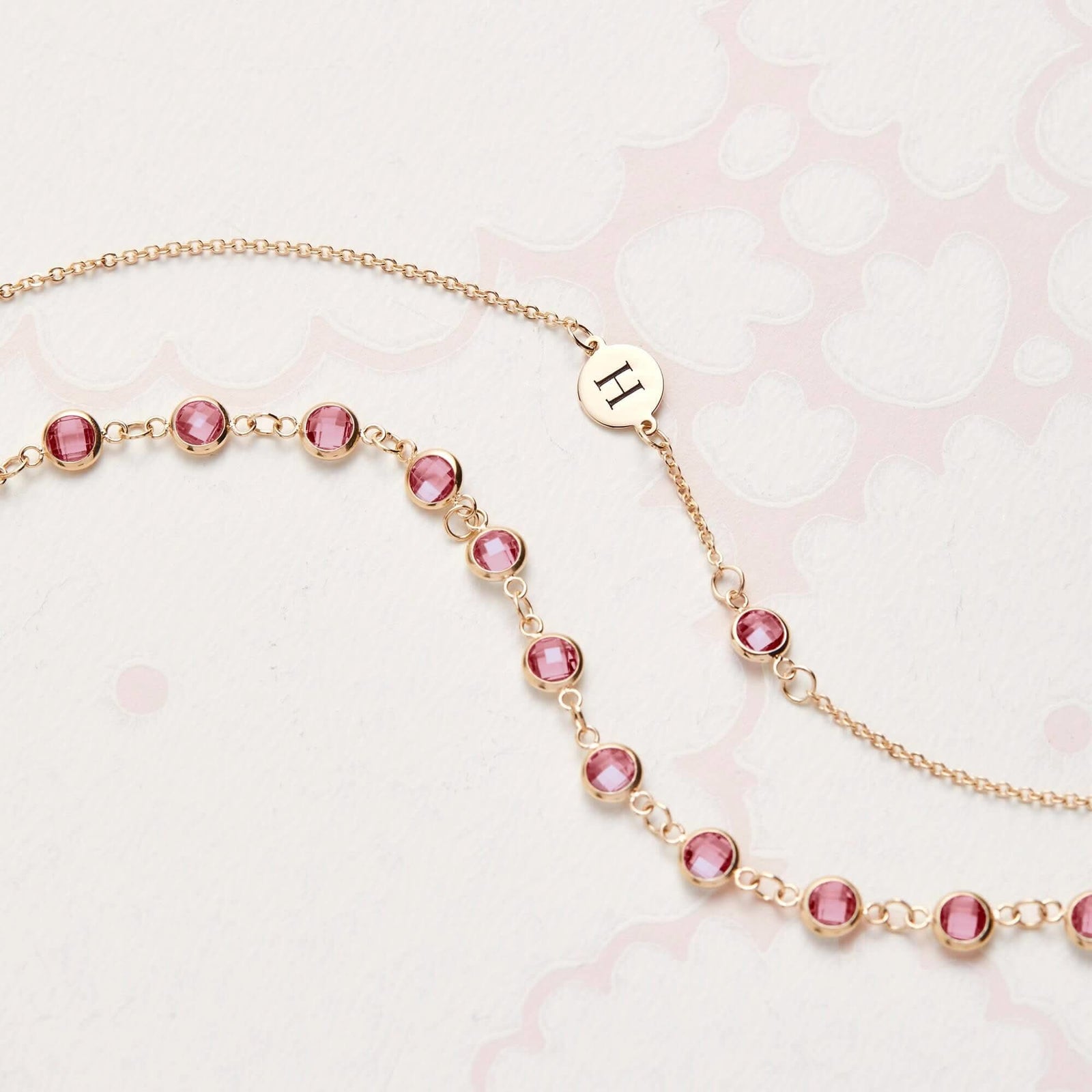 1 Letter & 1 Petite Pink Sapphire Bracelet in 14k Gold (October)