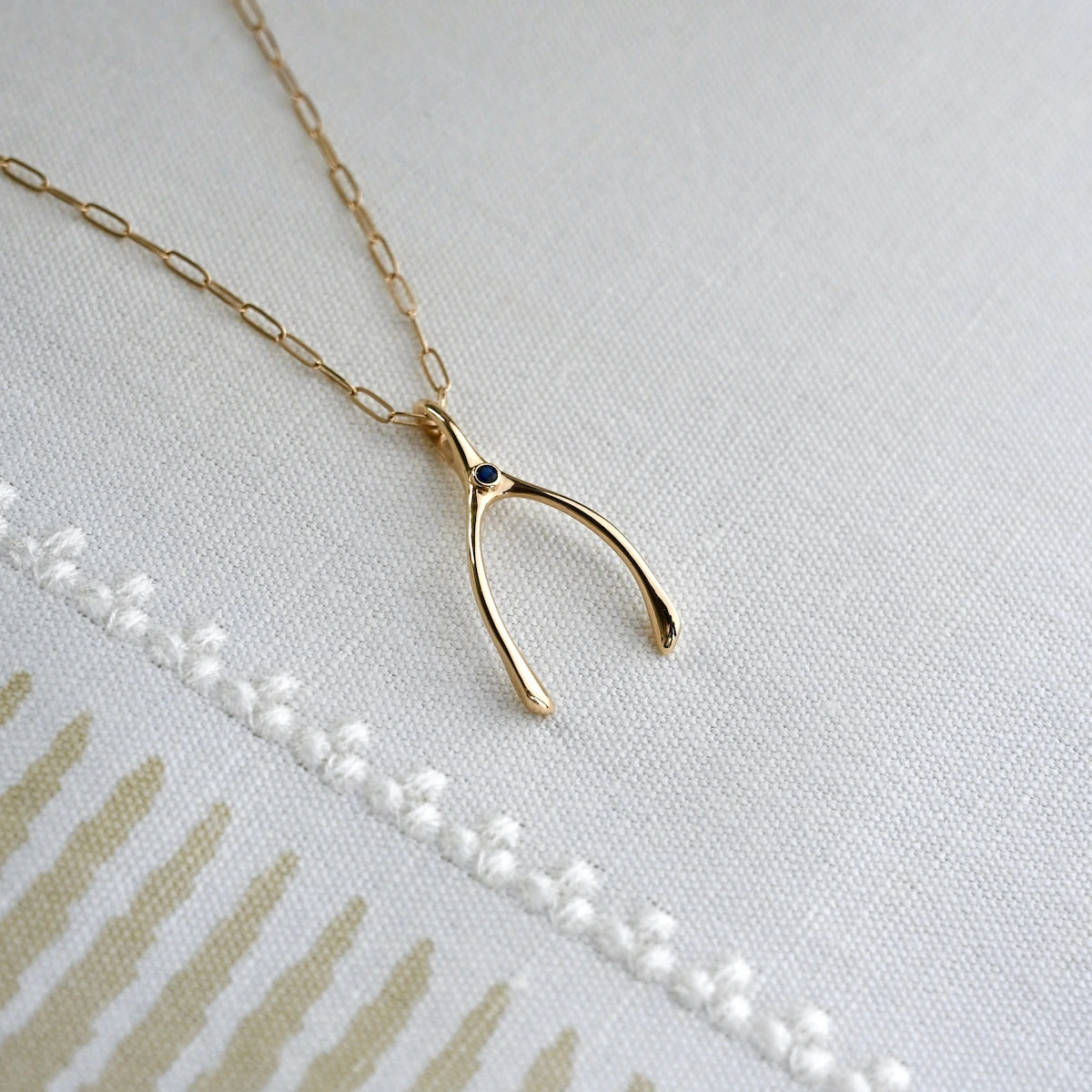 Large Sapphire Wishbone Pendant in Solid 14k Gold (September)