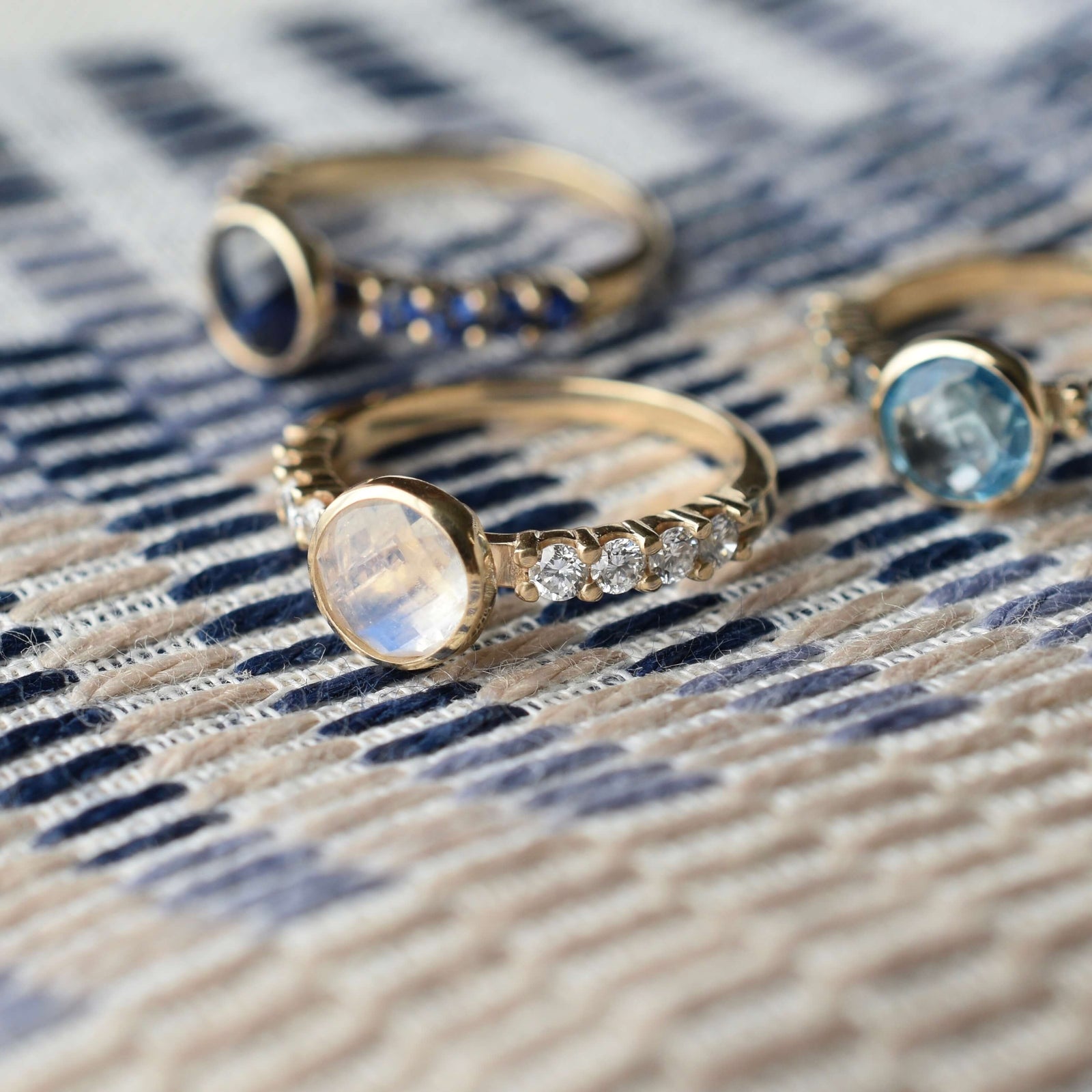 Assorted Haverhill jewelry, including a Rosecliff Grand Ring in 14k gold with a 6 mm briolette-cut Moonstone and eight 2 mm round-cut Diamonds.