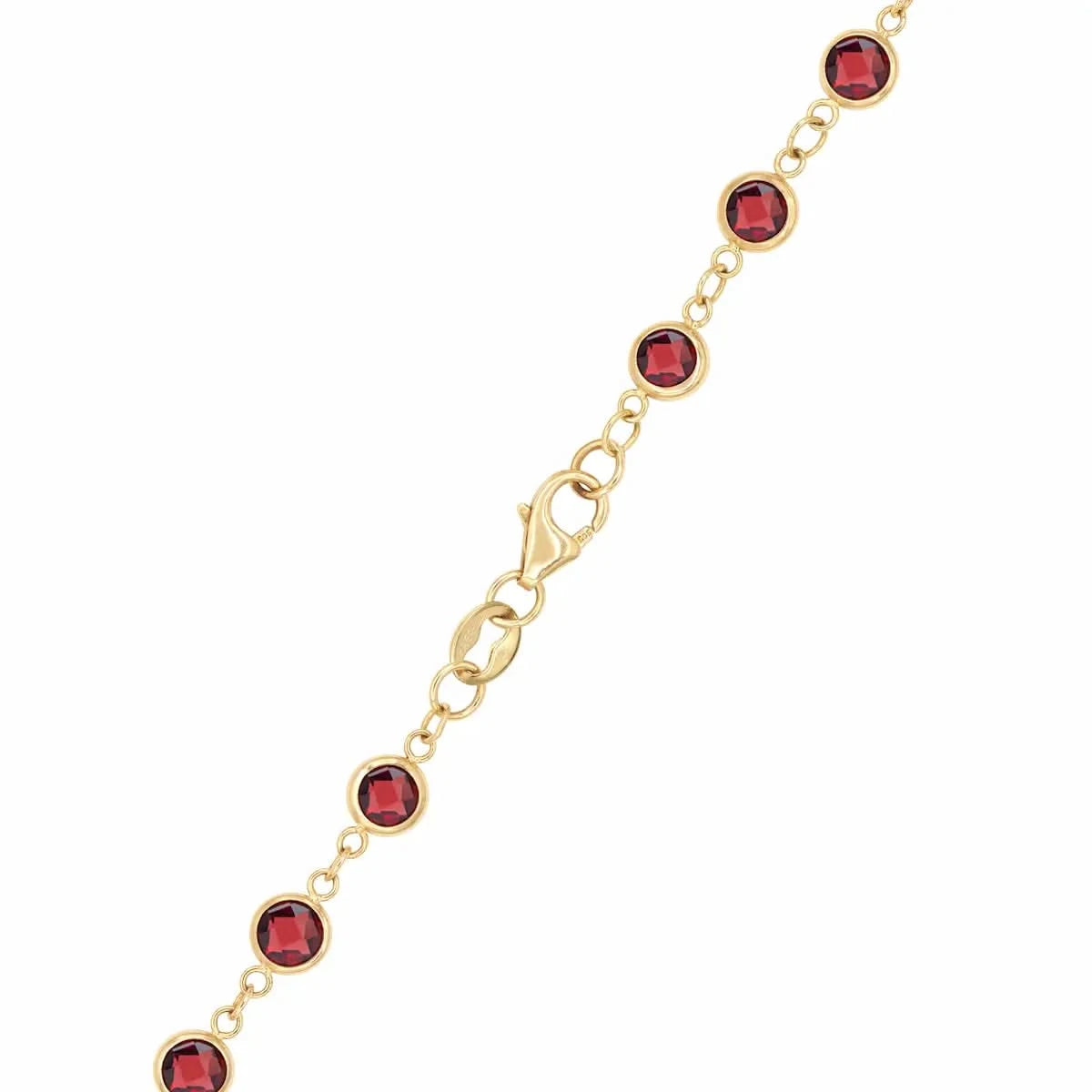 14k yellow gold 1.17 mm cable chain with a lobster claw clasp and 4 mm briolette cut bezel set garnets