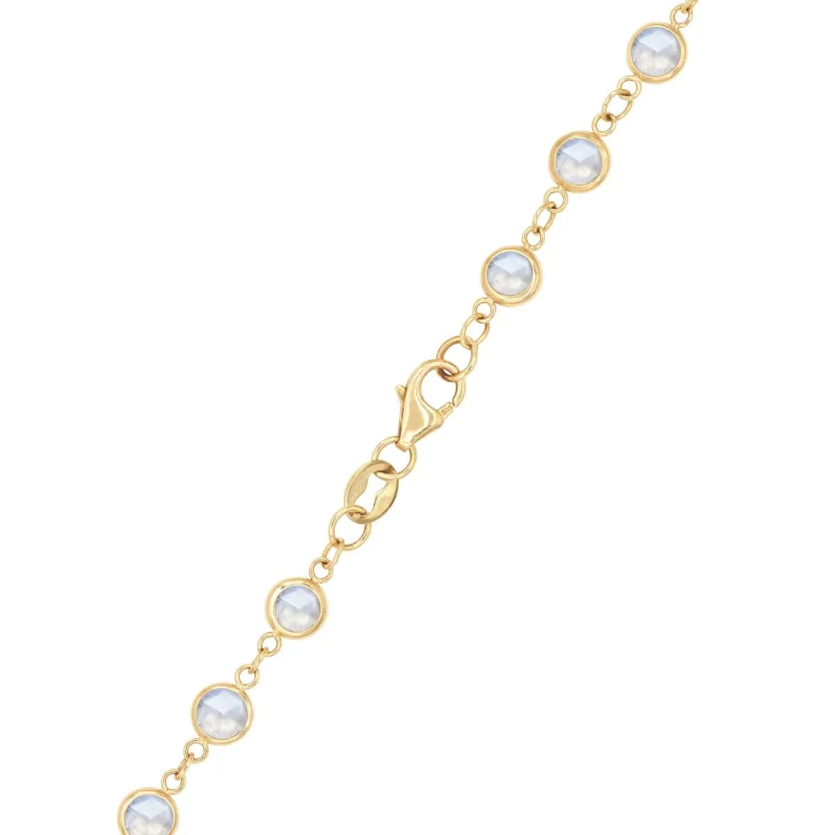 Close-up of the lobster clasp on the Newport Moonstone Long Necklace in 14k gold, showing secure closure and bezel-set stones.