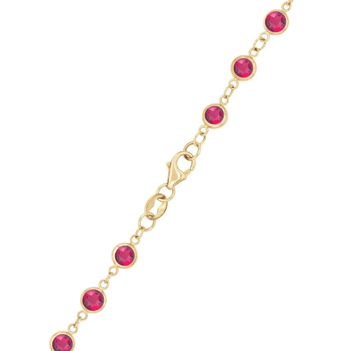 Close-up of the lobster clasp and bezel-set rubies on the Newport Ruby Long Necklace in 14k gold, honoring July birthdays.