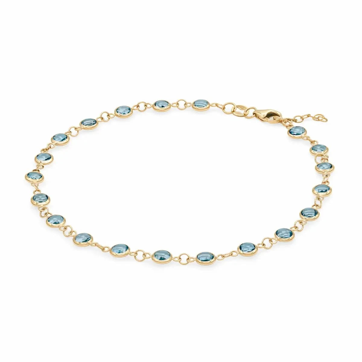 Newport 14k yellow gold bracelet featuring eighteen 4 mm briolette cut bezel set Nantucket blue topaz - angled view