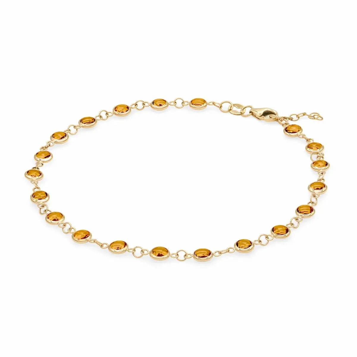 Newport 14k yellow gold bracelet featuring eighteen 4 mm briolette cut bezel set citrines - angled view