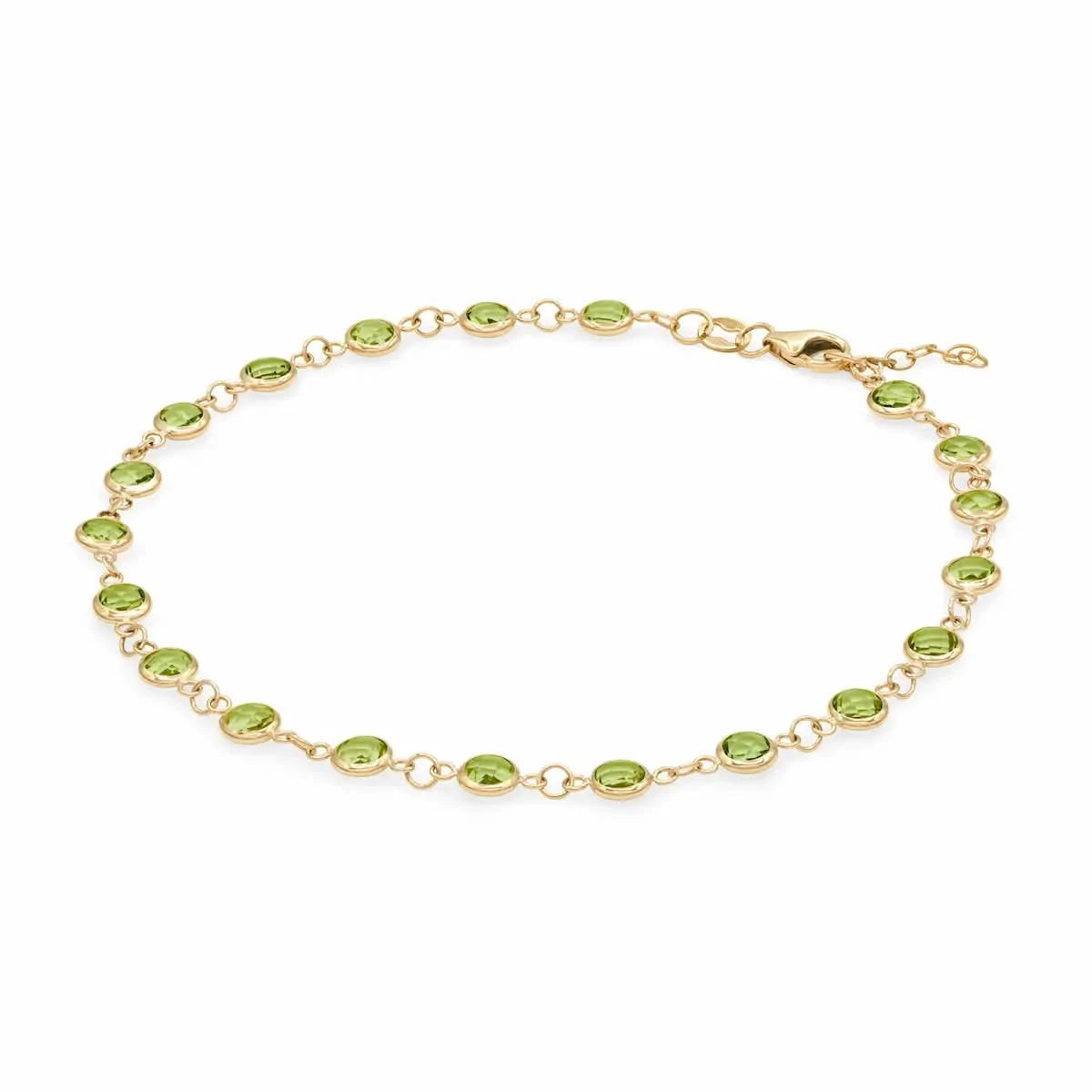 Newport 14k yellow gold bracelet featuring eighteen 4 mm briolette cut bezel set peridots - angled view
