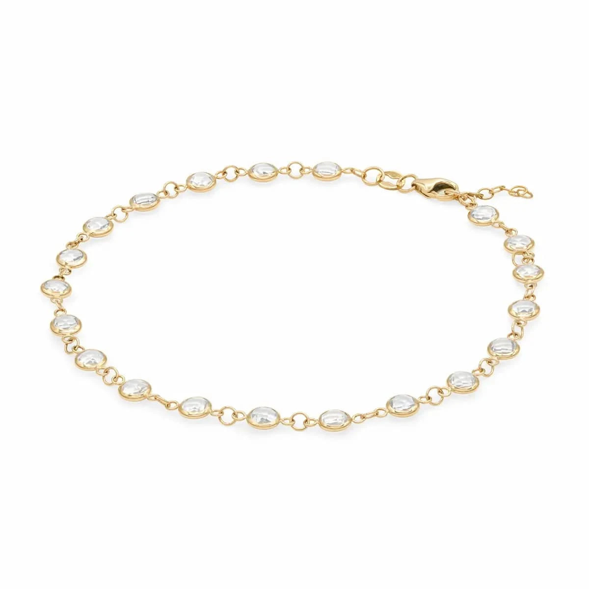 Newport 14k yellow gold bracelet featuring eighteen 4 mm briolette cut bezel set white topaz - angled view
