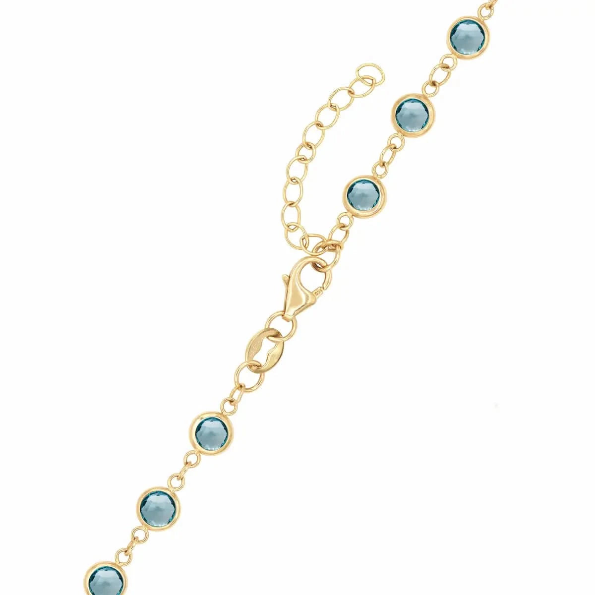 14k yellow gold 1.17 mm cable chain with a lobster claw clasp and 4 mm briolette cut bezel set Nantucket blue topaz