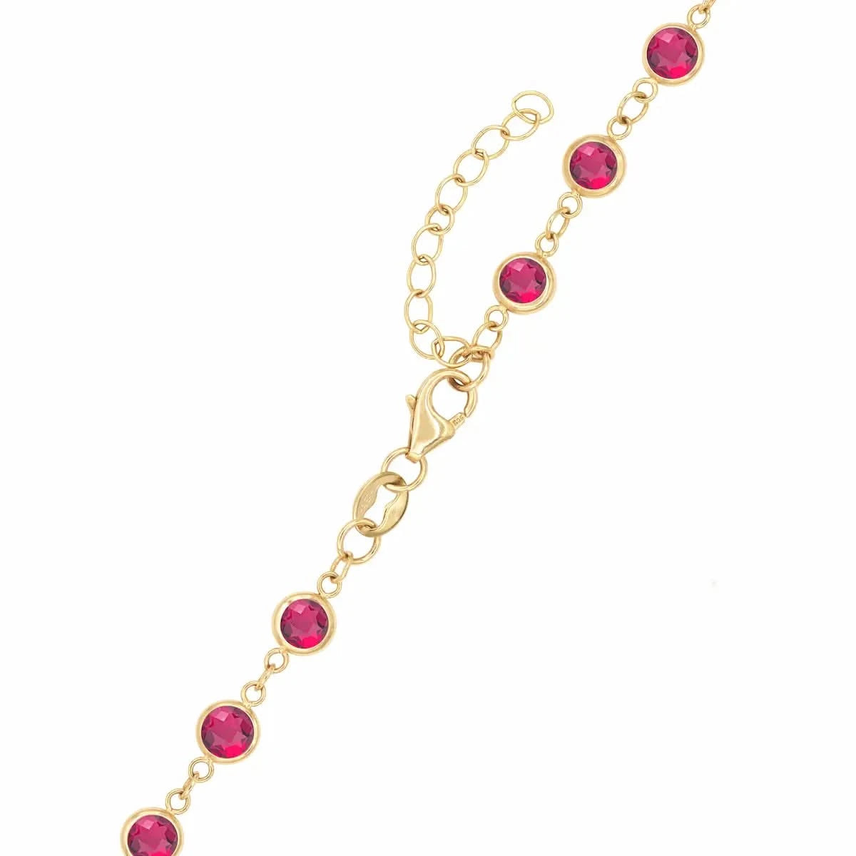 14k yellow gold 1.17 mm cable chain with a lobster claw clasp and 4 mm briolette cut bezel set rubies