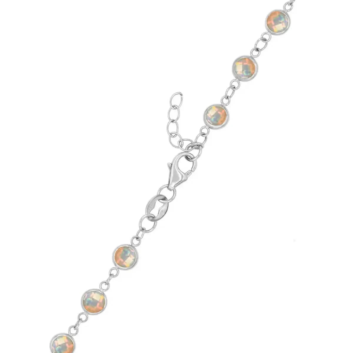 14k white gold 1.17 mm cable chain with a lobster claw clasp and 4 mm briolette cut bezel set opals