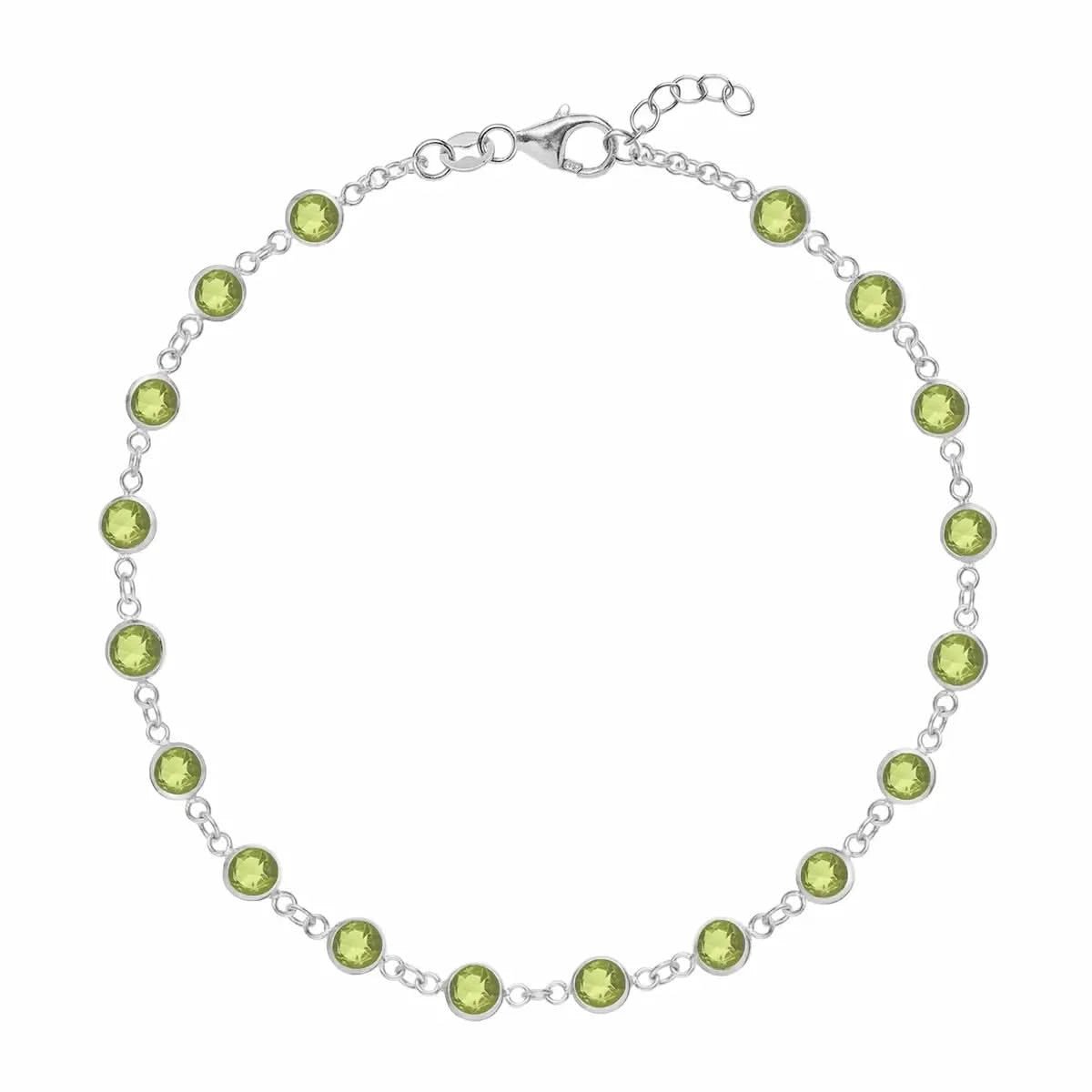 Newport 14k white gold bracelet featuring eighteen 4 mm briolette cut bezel set peridots