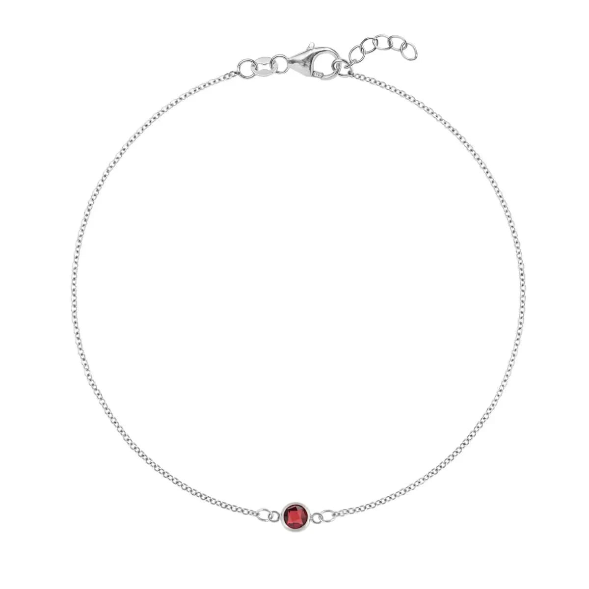 Classic cable chain bracelet featuring one 4 mm briolette cut garnet bezel set in 14k white gold