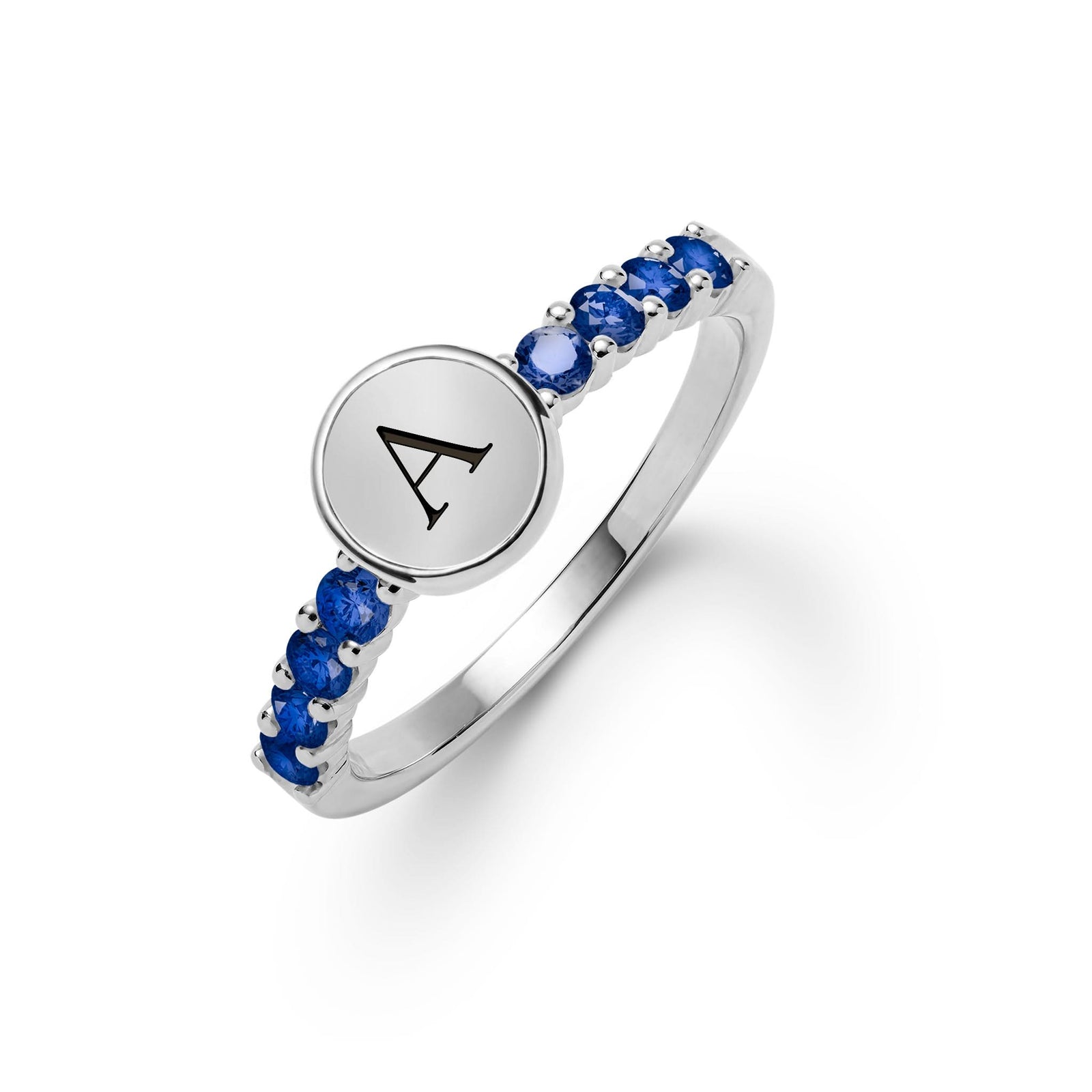 14k white gold Rosecliff Letter Ring, featuring a flat engraved letter disc with 2 mm faceted round cut, prong set, both sustainable Sapphire - aspect view
