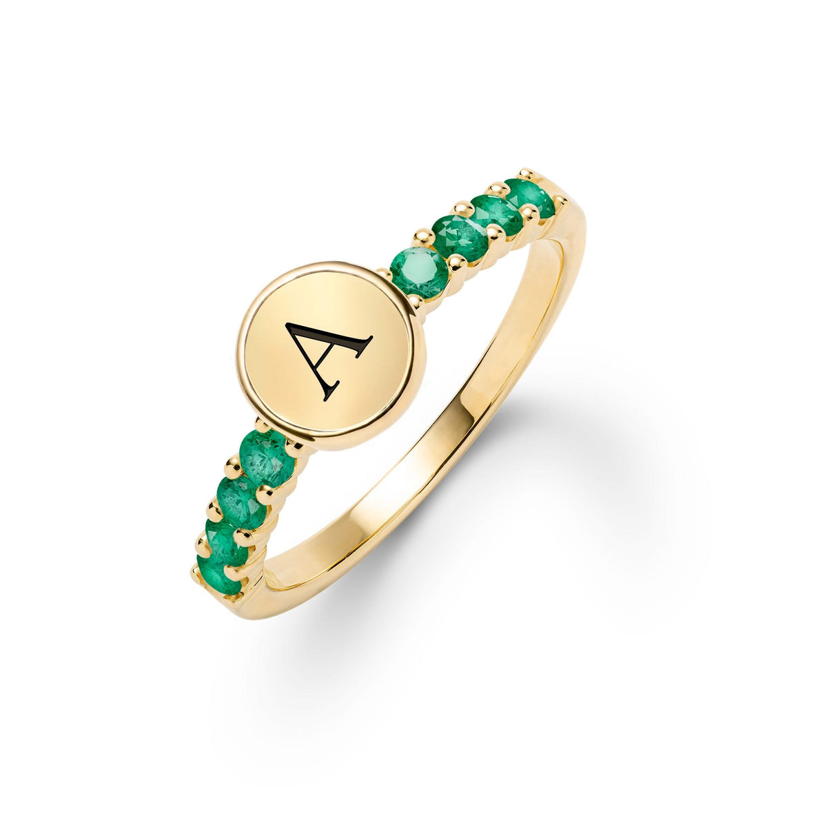 14k gold Rosecliff Letter Emerald Ring, featuring a flat engraved letter disc nestled between 2 mm faceted round cut, prong set Emeralds - aspect view
