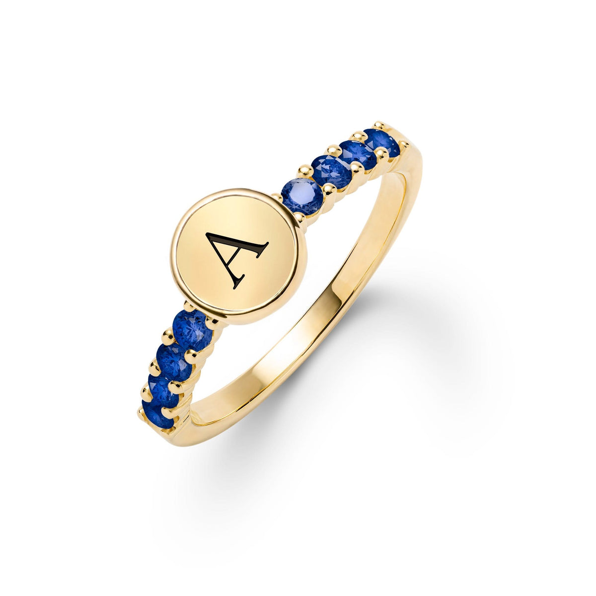 14k gold Rosecliff Letter Ring, featuring a flat engraved letter disc nestled between alternating 2 mm faceted round cut, prong set Sapphire - aspect view