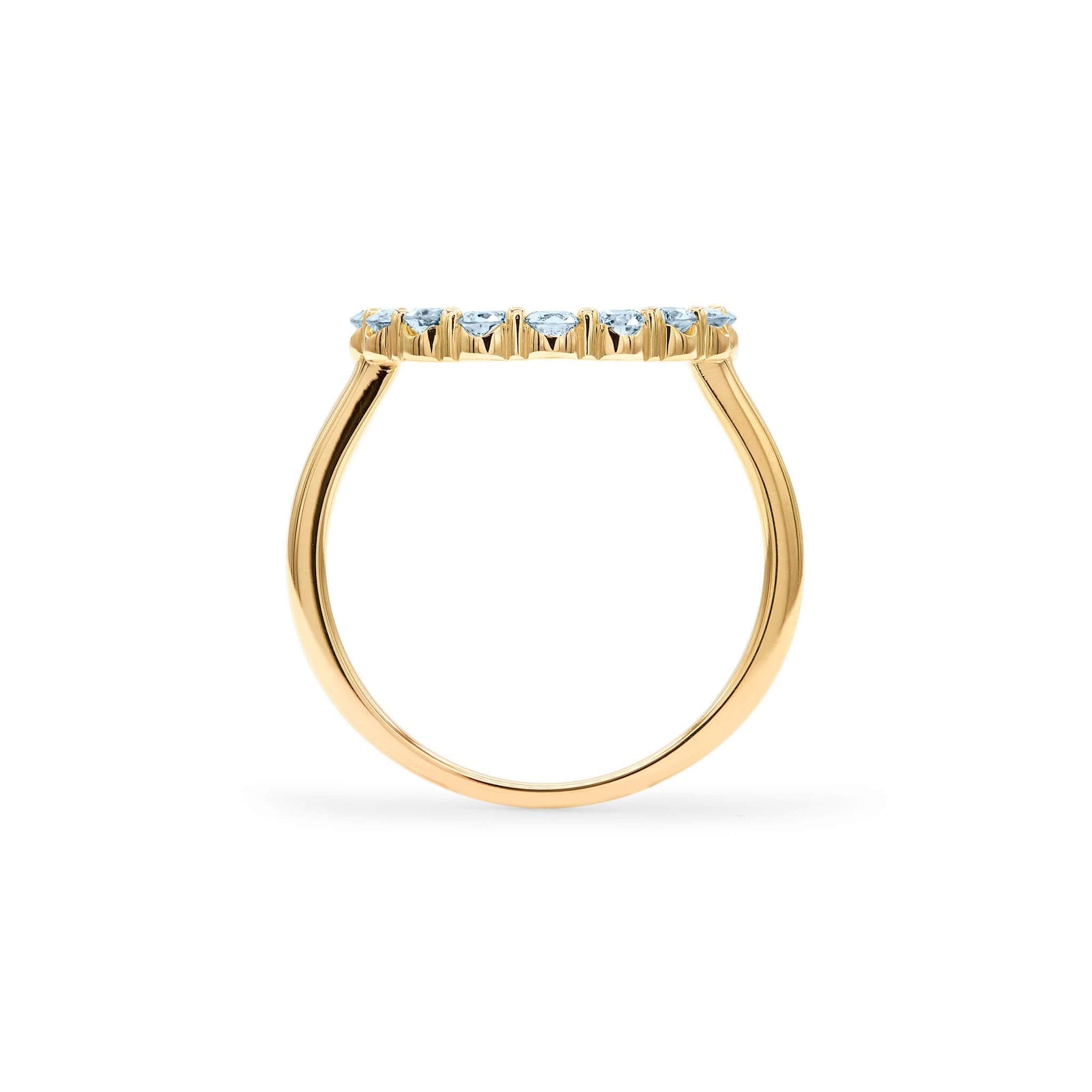 Rosecliff open circle ring featuring sixteen 2 mm round cut Nantucket blue topaz prong set in 14k yellow gold - standing view