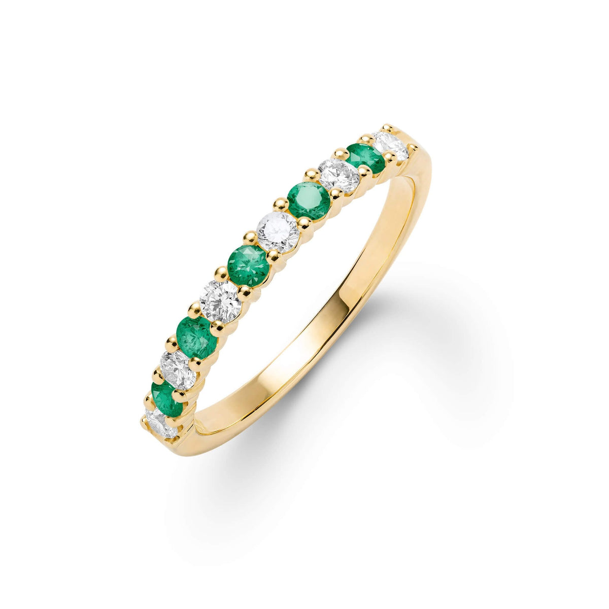 Rosecliff stackable ring featuring eleven alternating 2mm emeralds and diamonds prong set in 14k yellow gold - front view