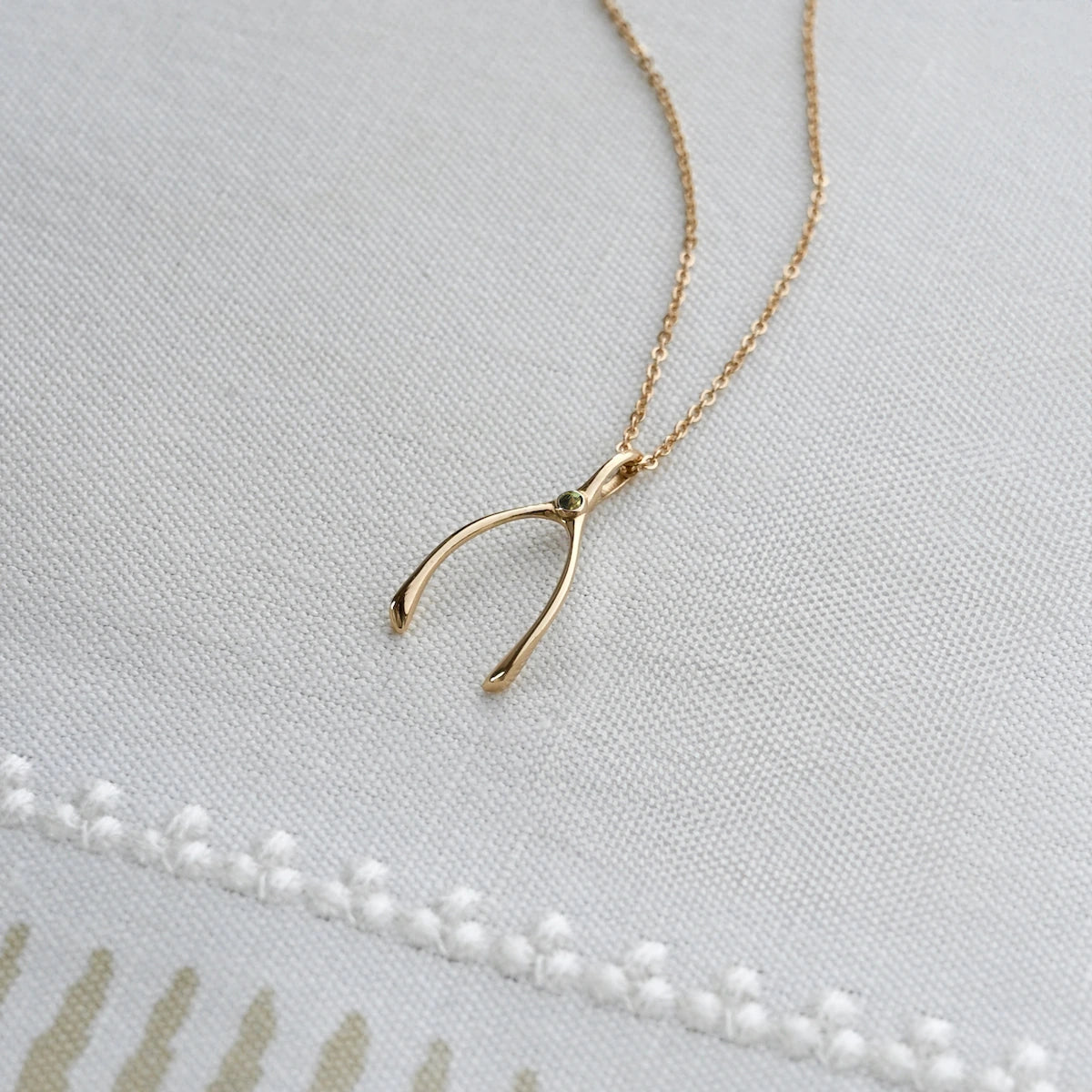 Small Peridot Wishbone Pendant in Solid 14k Gold (August)