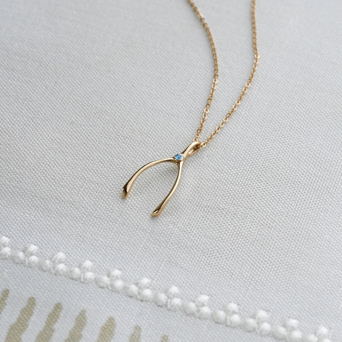 Small Nantucket Blue Topaz Wishbone Pendant in Solid 14k Gold (December)