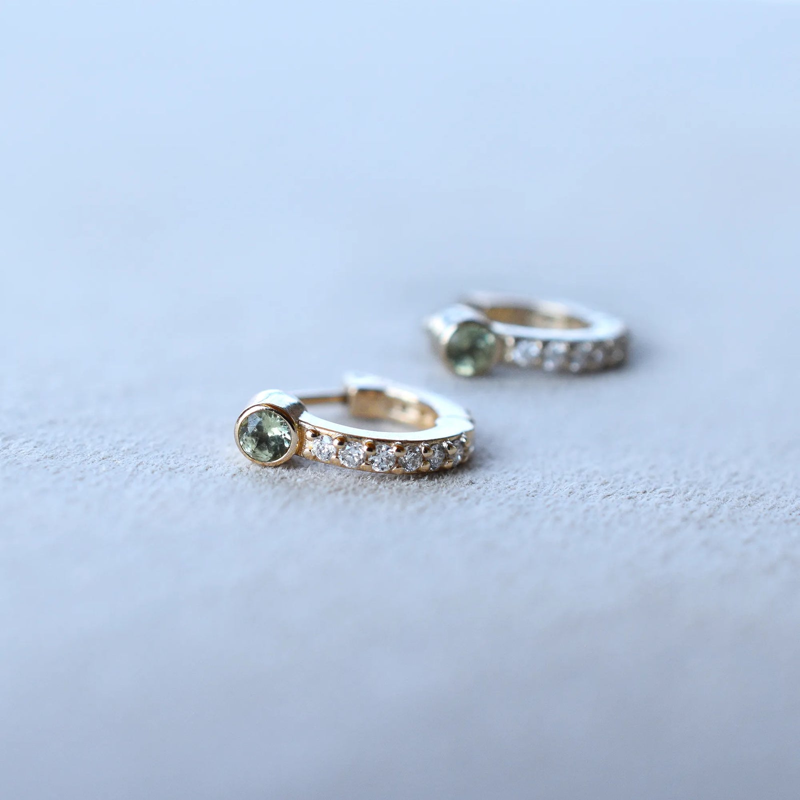 Tiny Peridot Huggie Hoops with Diamonds in 14k Gold (August)