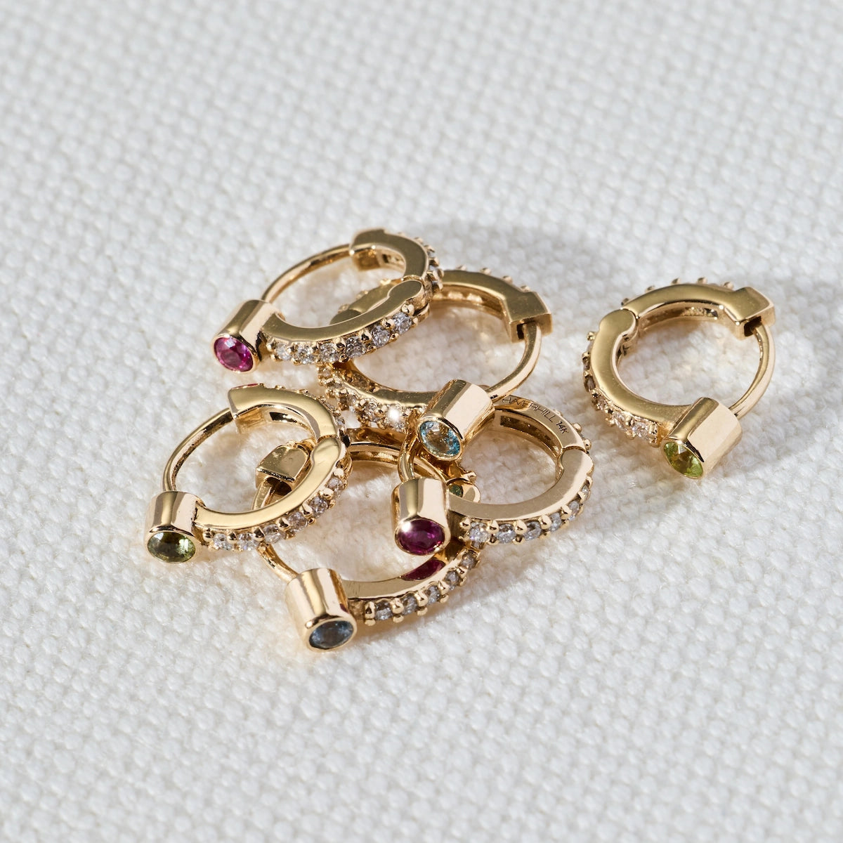 Tiny Peridot Huggie Hoops with Diamonds in 14k Gold (August)