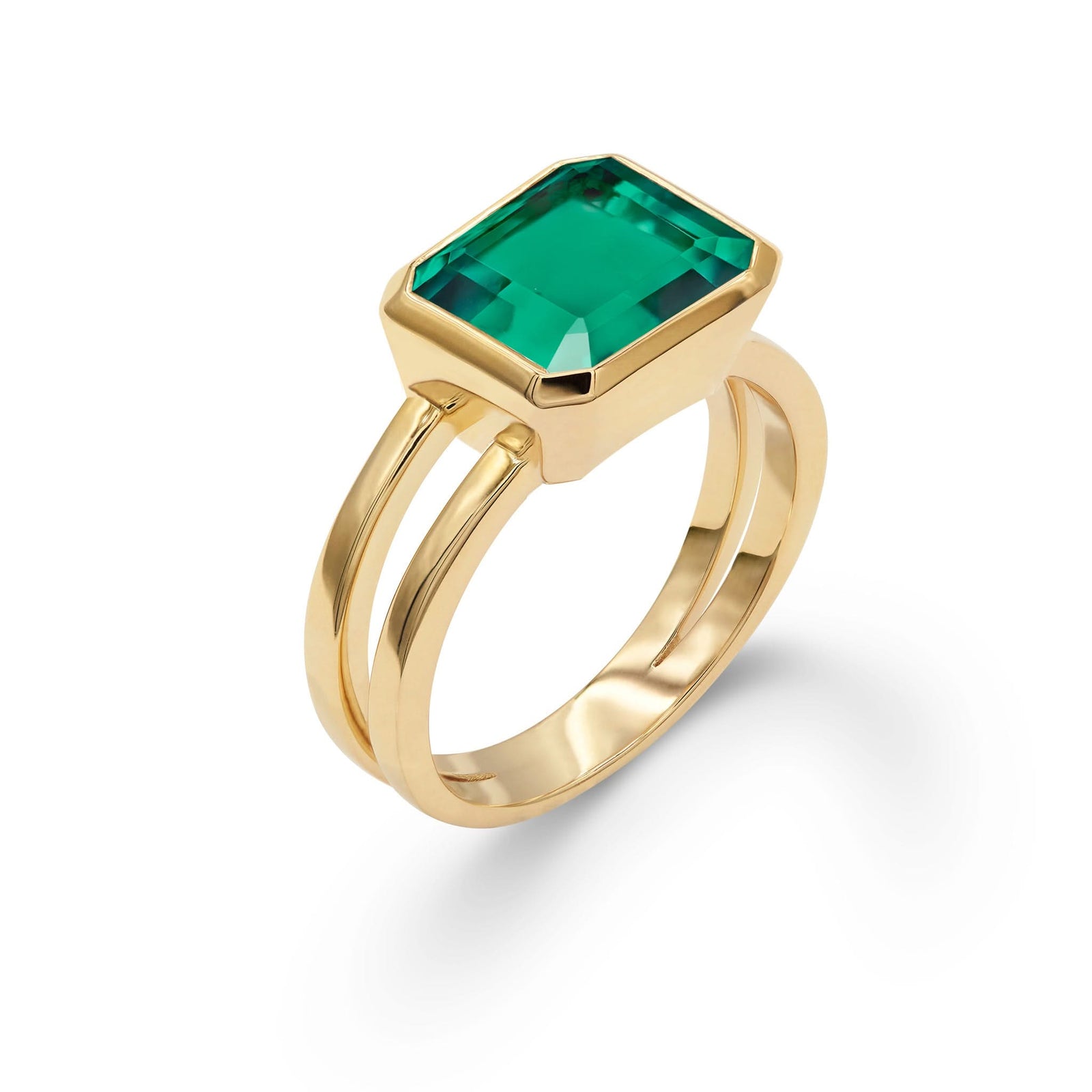 Warren Horizontal Emerald Ring, featuring an emerald-cut 8 x 10mm Emerald in 14k gold, hand-set horizontally in a 14k-gold bezel - aspect view.