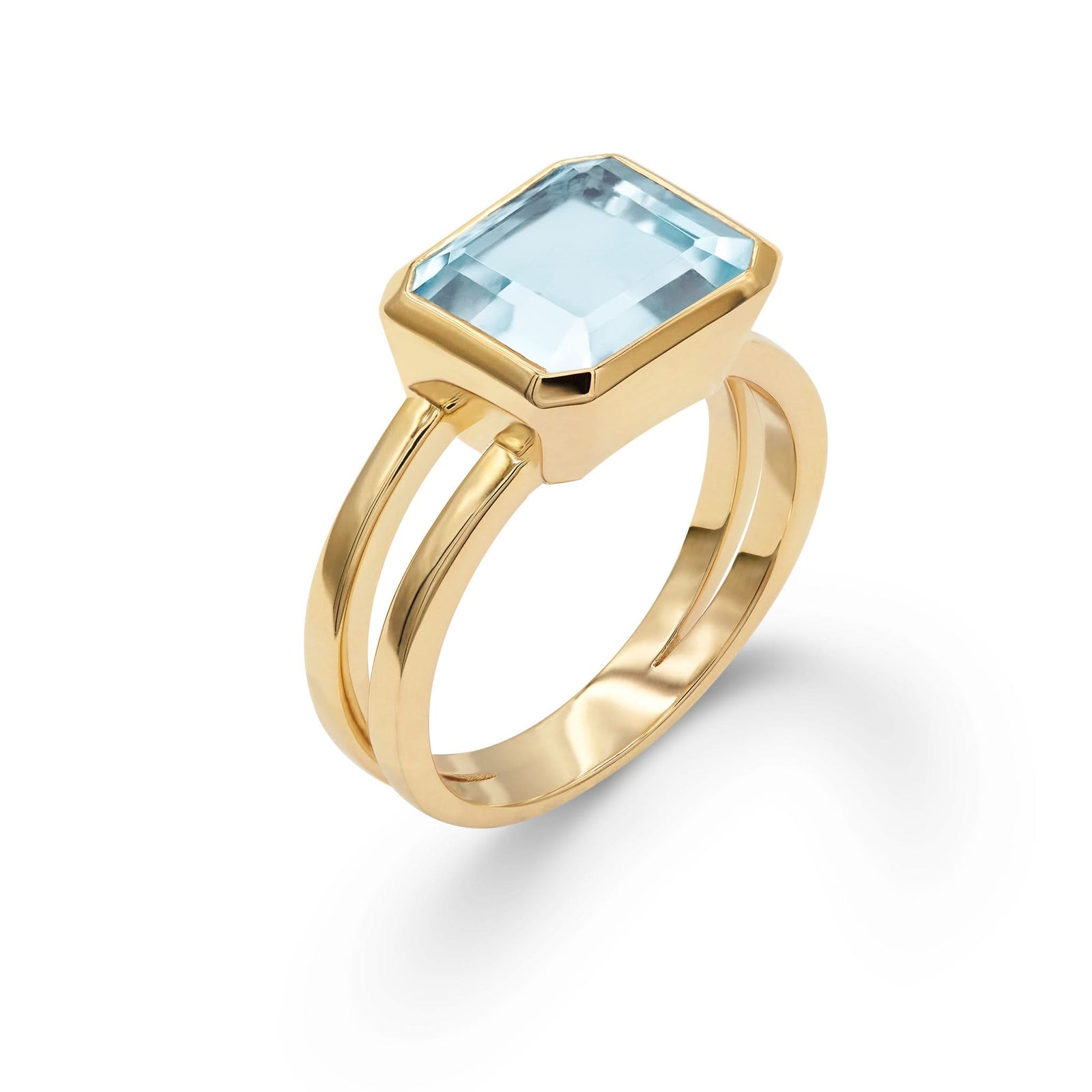 Warren Horizontal Nantucket Blue Topaz Ring, featuring an emerald-cut 8 x 10mm Nantucket Blue Topaz in 14k gold - aspect view.