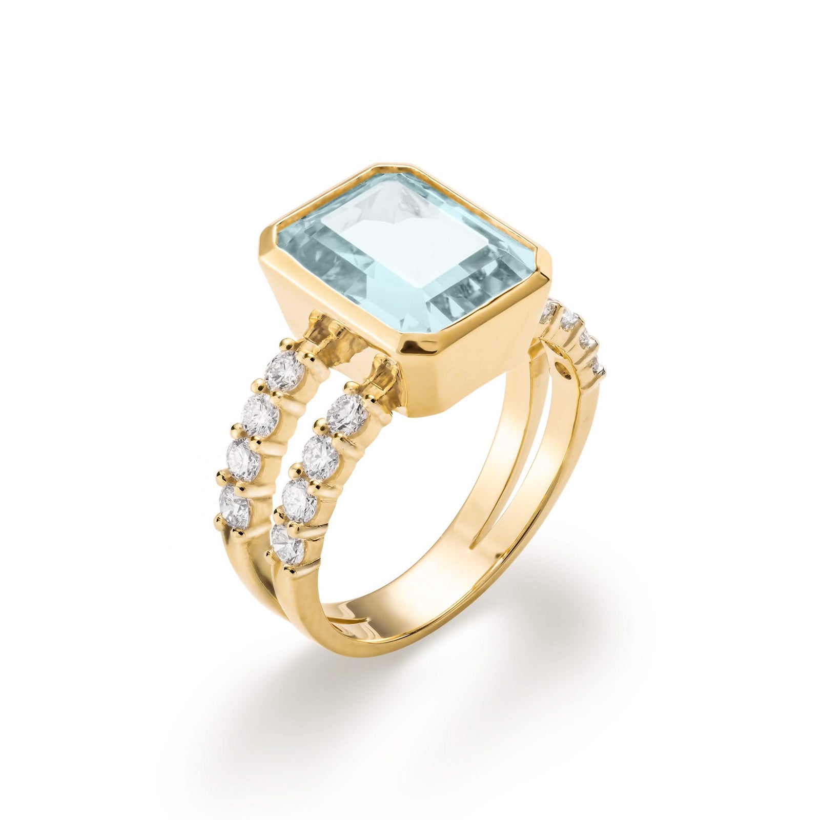 Warren ring in 14k yellow gold with accent diamonds featuring one 10 x 8 mm emerald cut Nantucket blue topaz - aspect view