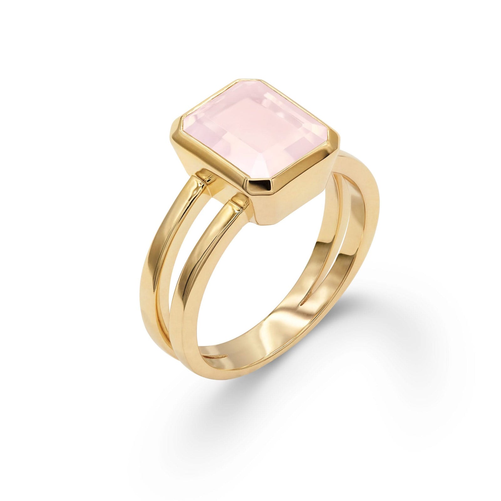 Warren ring in 14k yellow gold featuring one 10 x 8 mm emerald cut bezel set rose quartz - aspect view