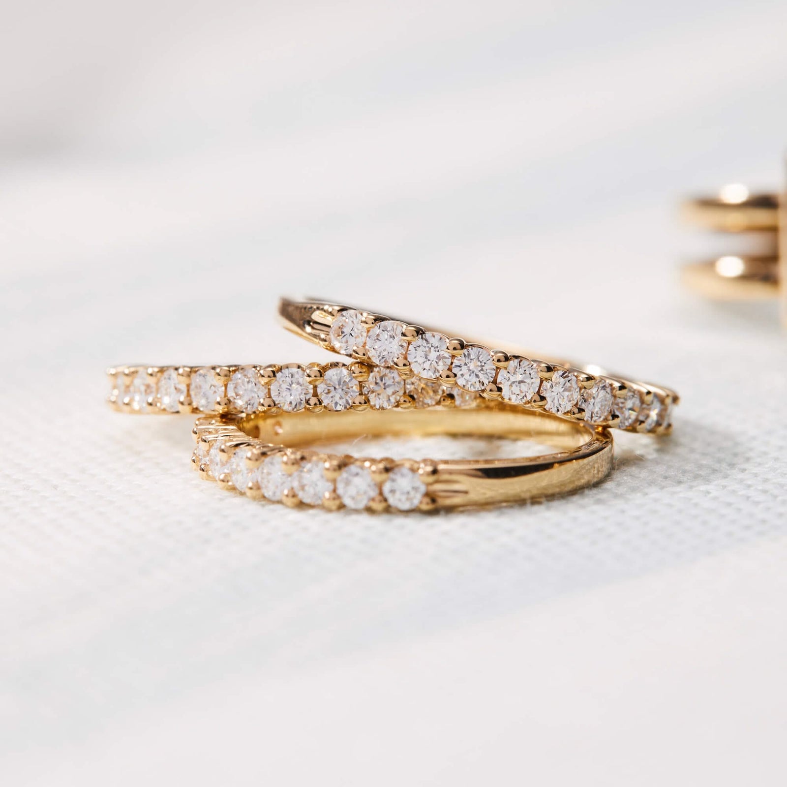 Trio of Rosecliff Diamond Stackable Rings in 14k gold, stacked together,