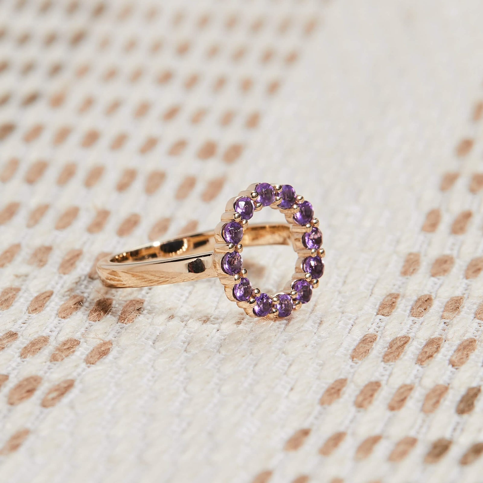 Personalized Rosecliff Small Circle Birthstone Ring in 14k gold featuring a sparkly open circle with genuine Amethyst in single stone patterns