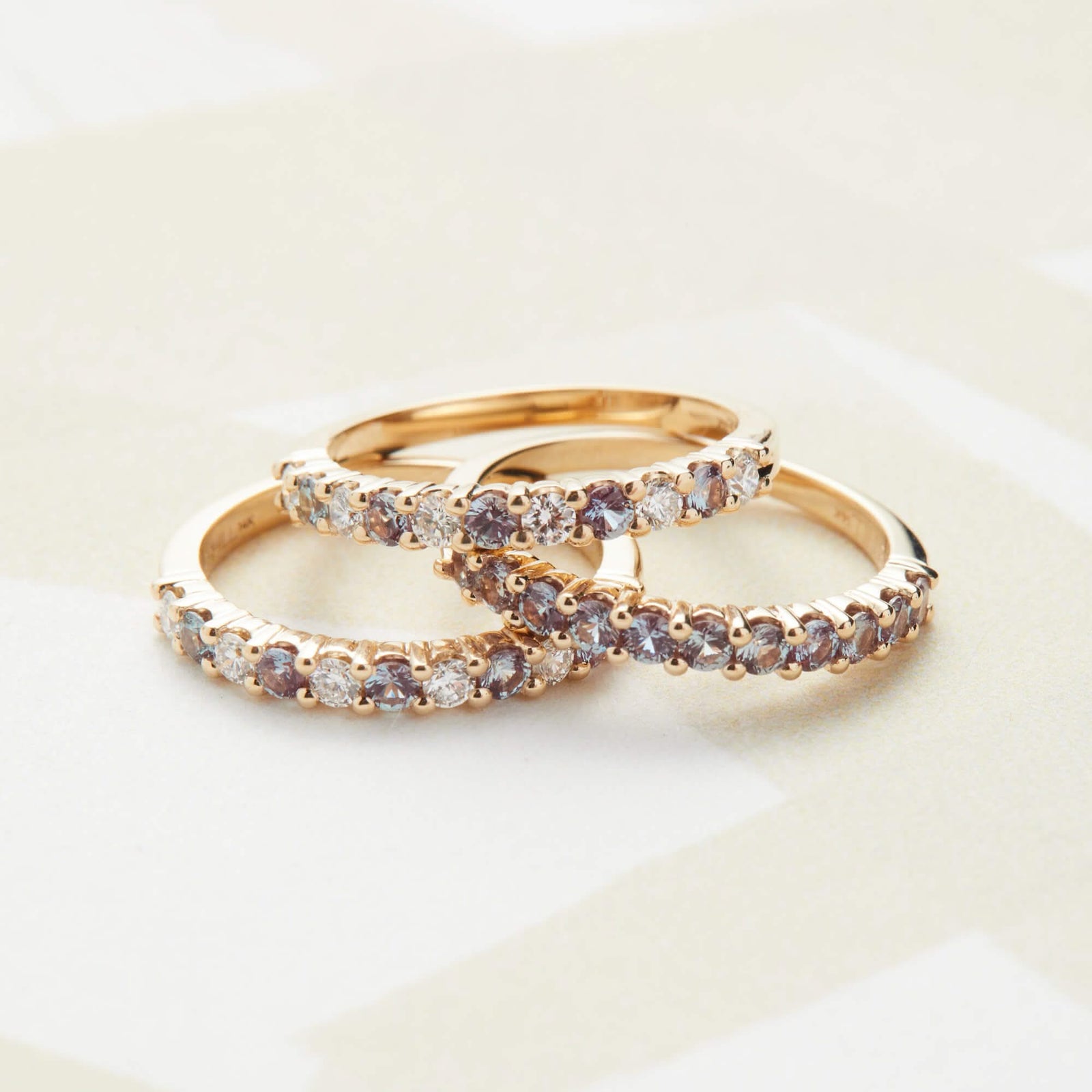 Assorted Rosecliff Stackable rings, including a dazzling 14k yellow gold ring with eleven 2mm round-cut alexandrites