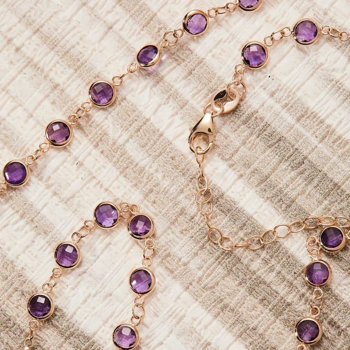 Flatlay showing chain extender and clasp detail of Newport amethyst necklace.