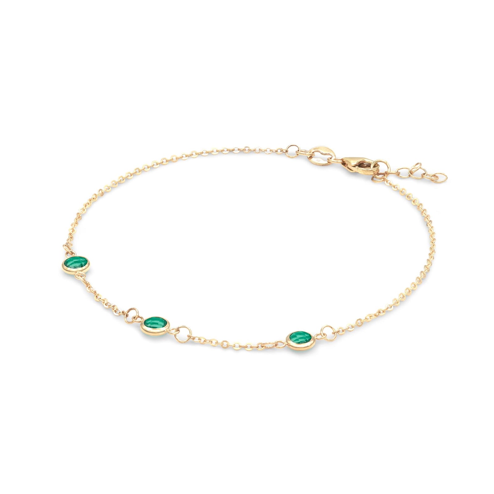 Bayberry 1.17 mm cable chain birthstone bracelet featuring three 4 mm briolette emeralds bezel set in 14k gold - angled view