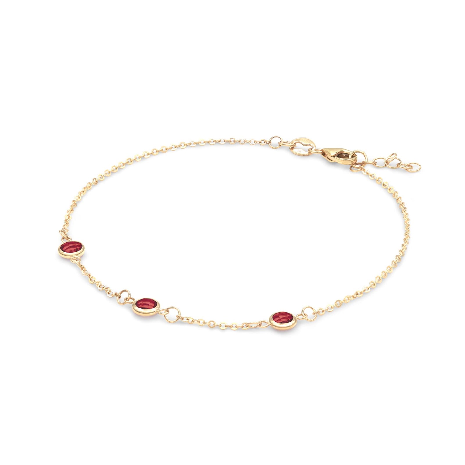Bayberry 1.17 mm cable chain birthstone bracelet featuring three 4 mm briolette garnets bezel set in 14k gold - angled view