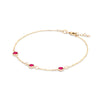 Bayberry 1.17 mm cable chain birthstone bracelet featuring three 4 mm briolette rubies bezel set in 14k gold - angled view