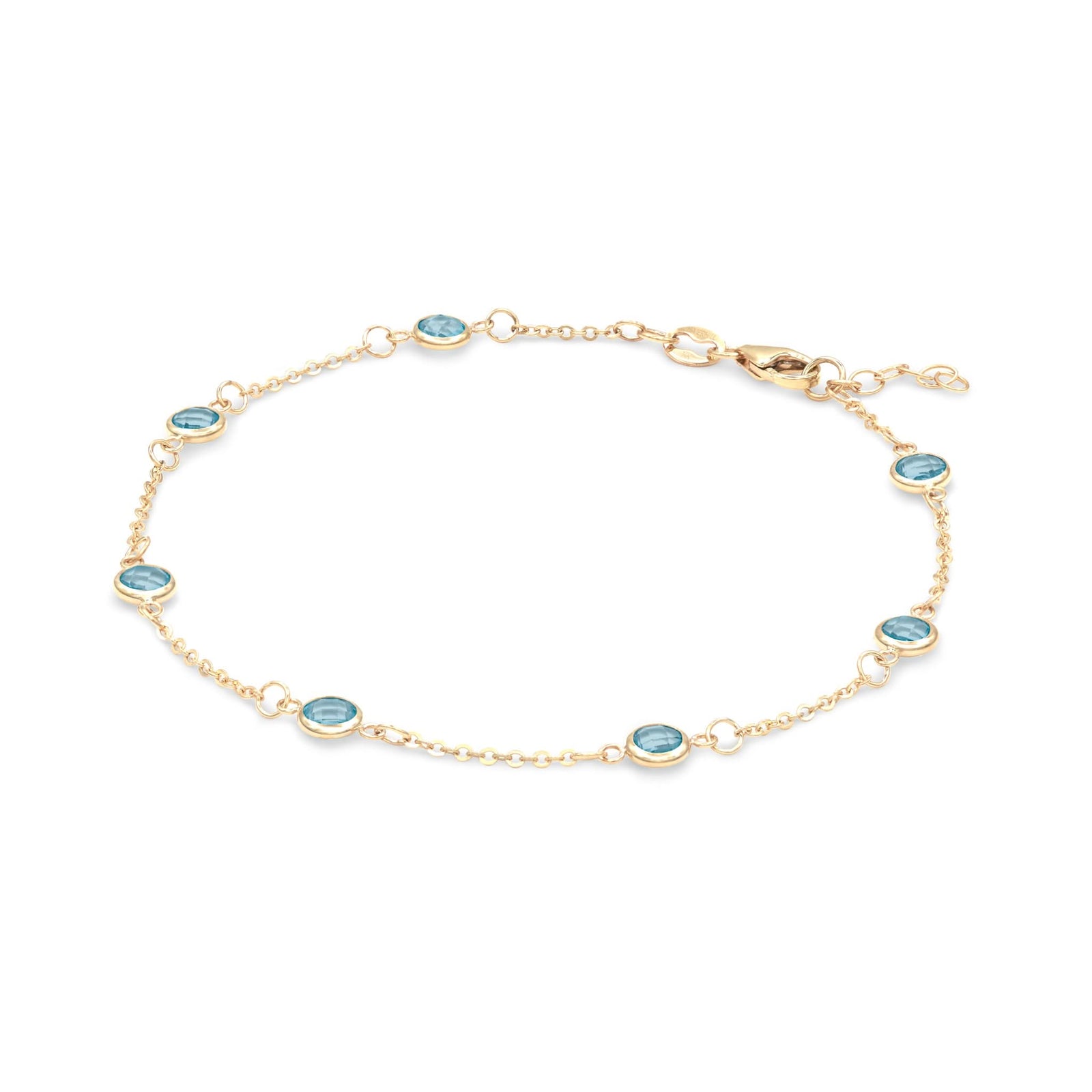 Bayberry cable chain birthstone bracelet featuring seven 4 mm briolette Nantucket blue topaz set in 14k gold - angled view