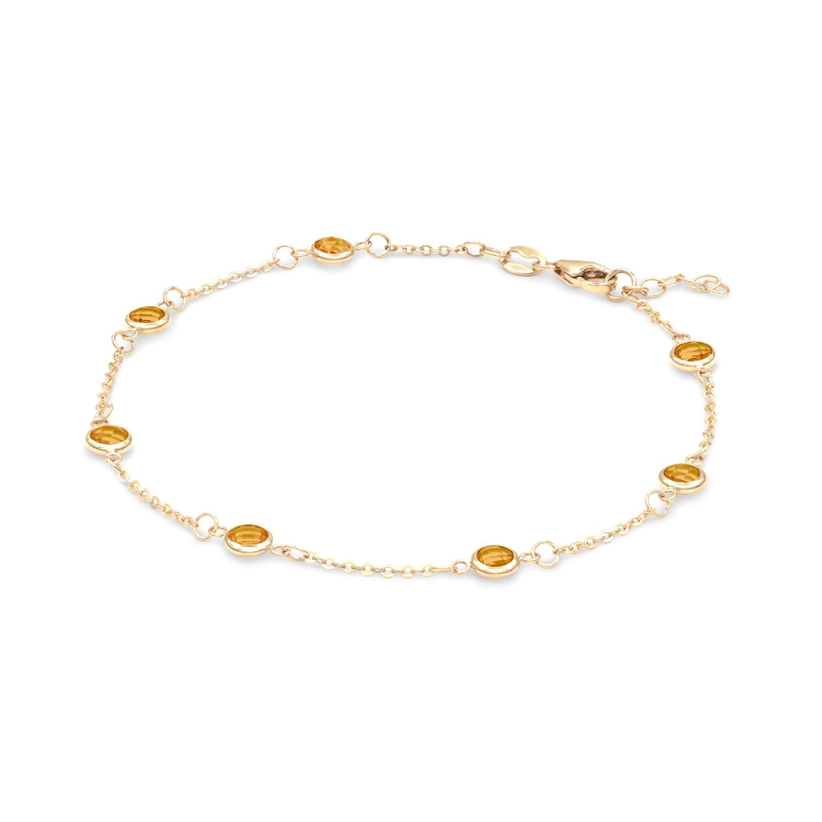 Bayberry 1.17 mm cable chain birthstone bracelet featuring seven 4 mm briolette citrines bezel set in 14k gold - angled view