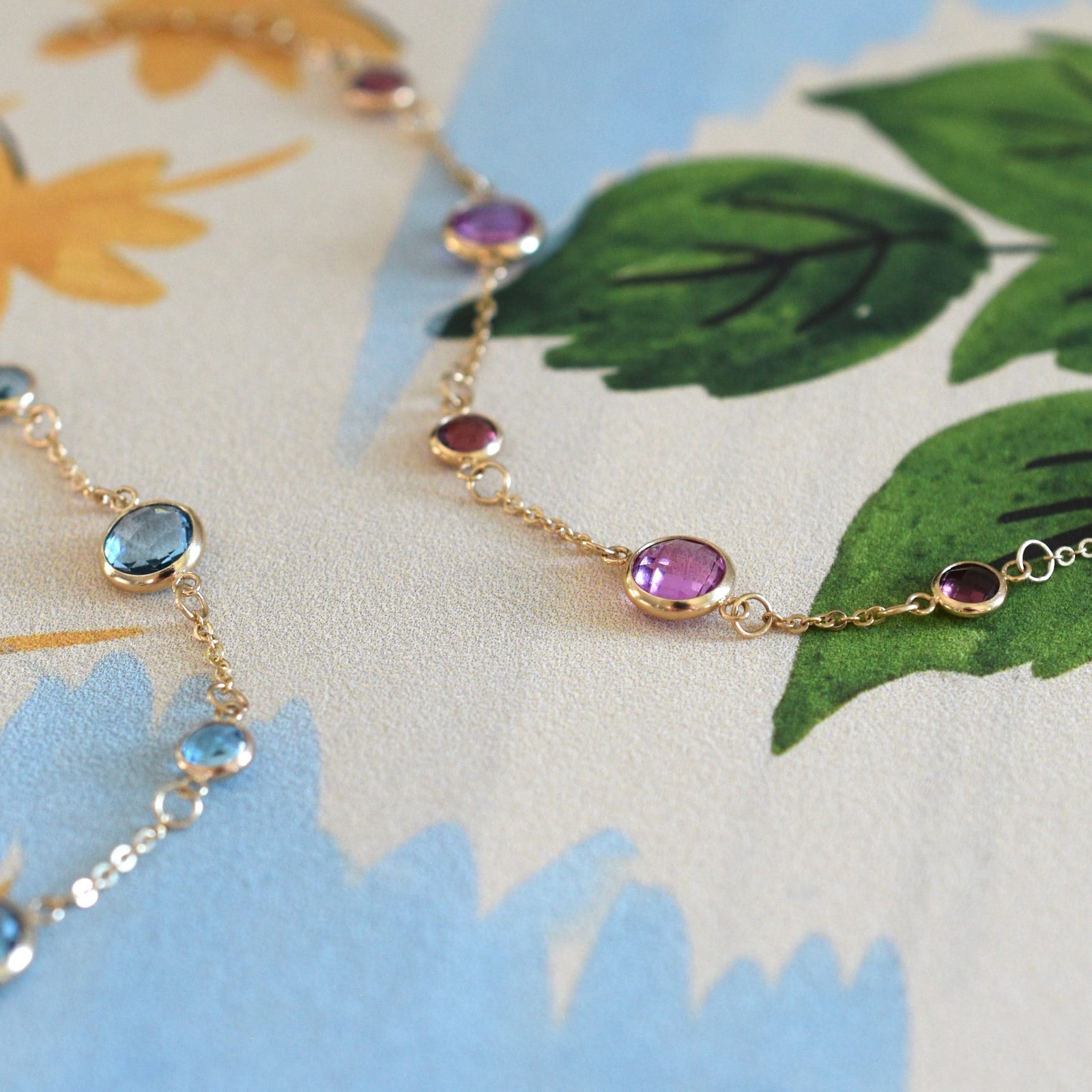 Two Bayberry Grand & Classic cable 1.17 mm chain bracelets in 14k gold featuring alternating 4 mm and 6 mm gemstones