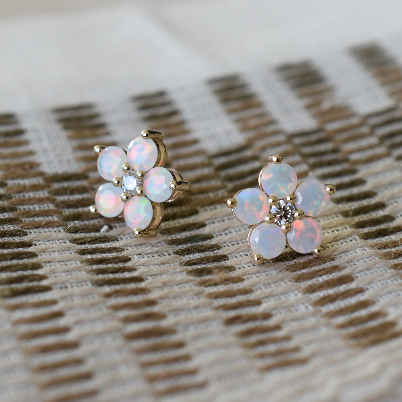 Pair of 14k yellow gold Greenwich 5 Birthstone earrings each featuring five 4 mm gemstones and one 2.1 mm diamond