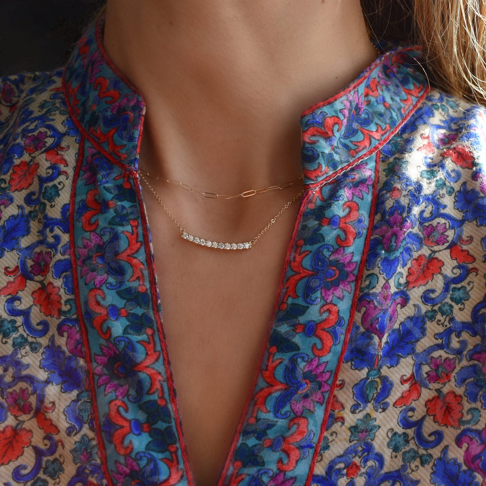 Woman wearing a Rosecliff Bar Necklace featuring eleven 2 mm diamonds prong set in 14k Yellow Gold - Front View