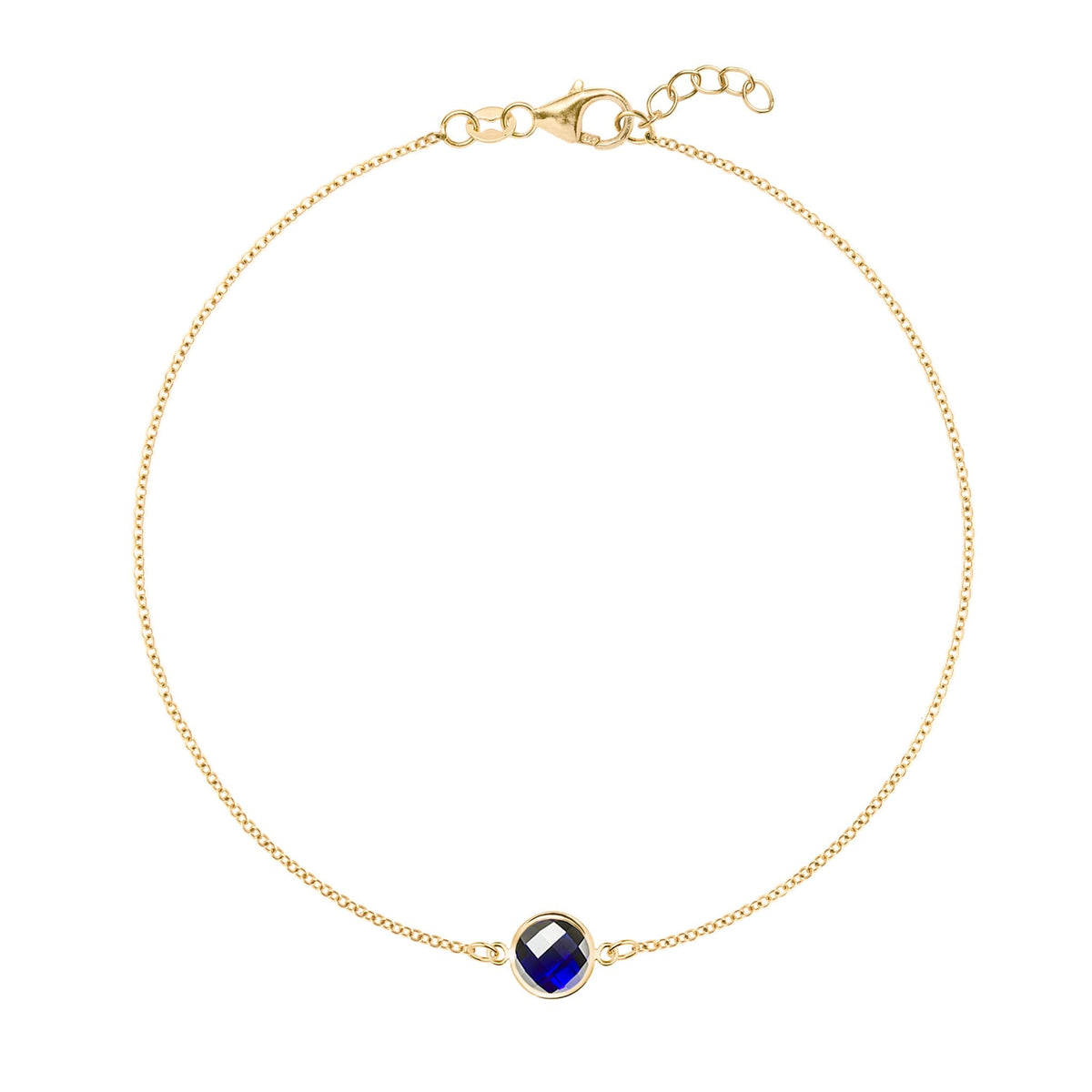 Grand 1.17 mm cable chain bracelet in 14k yellow gold featuring one 6 mm briolette cut bezel set sapphire - front view