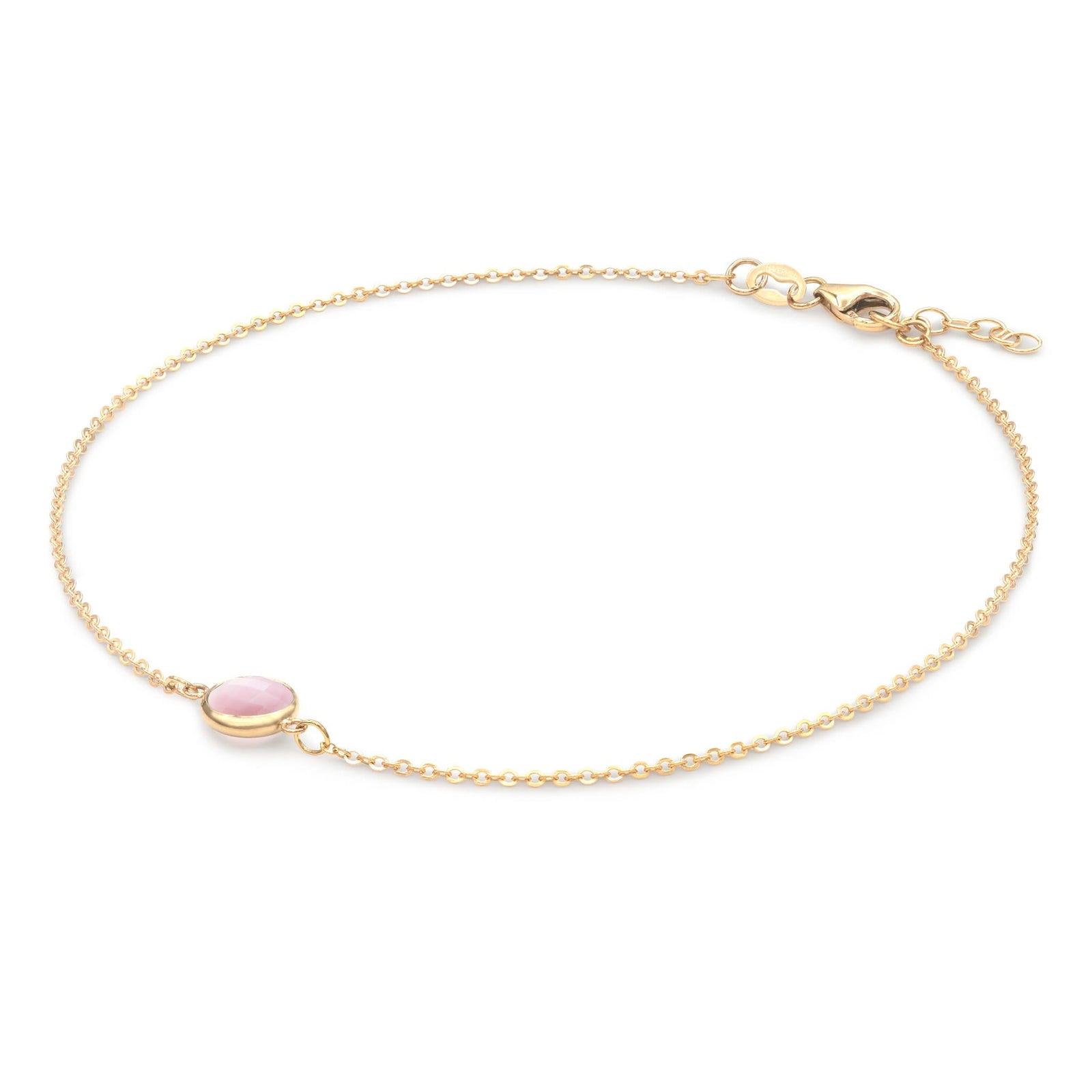 Grand 1.17 mm cable chain bracelet in 14k yellow gold featuring one 6 mm briolette cut bezel set pink opal - angled view
