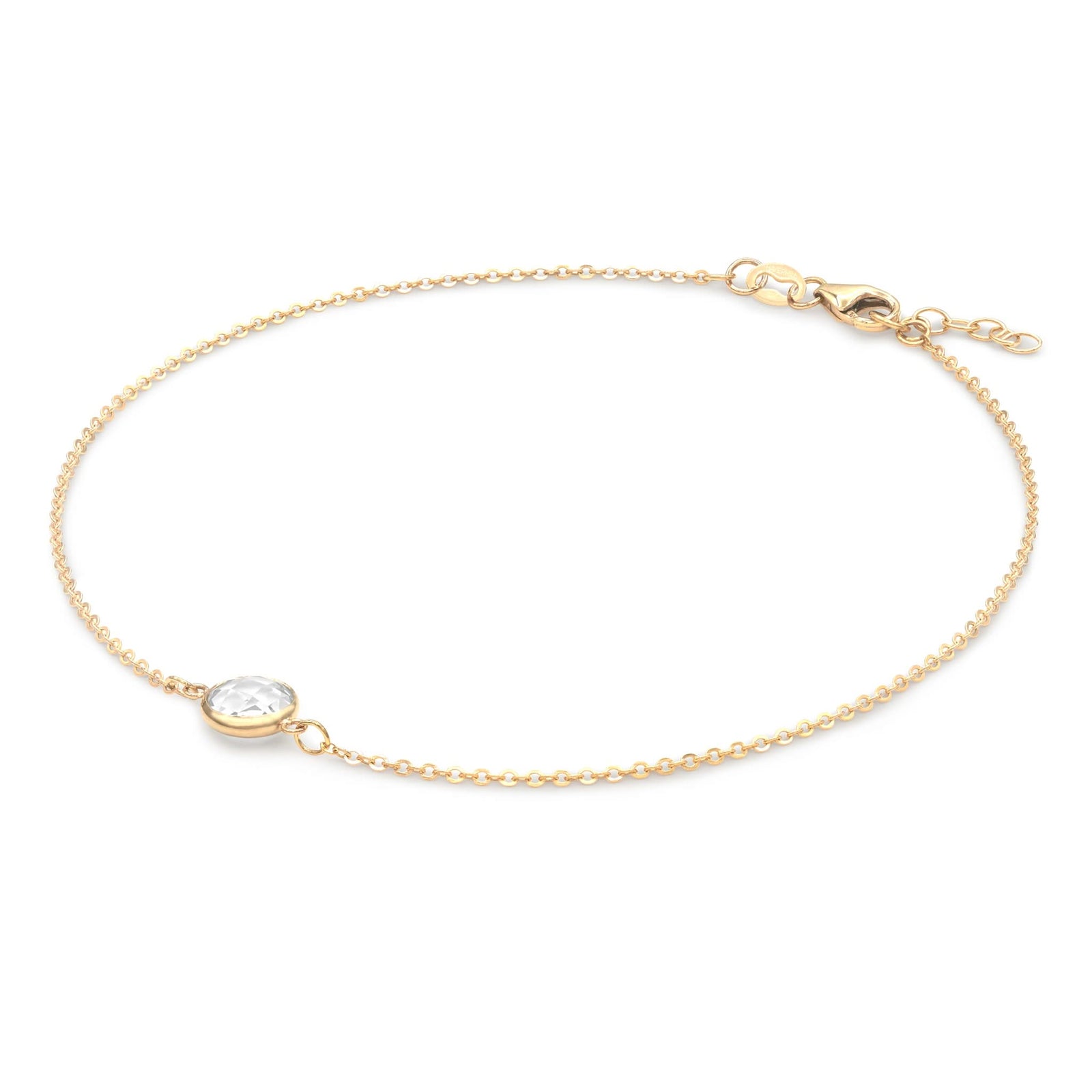 Grand 1.17 mm cable chain bracelet in 14k yellow gold featuring one 6 mm briolette cut bezel set white topaz - angled view