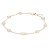 Grand 1.17 mm cable chain bracelet featuring 6 mm briolette cut gemstones bezel set in 14k gold - angled view
